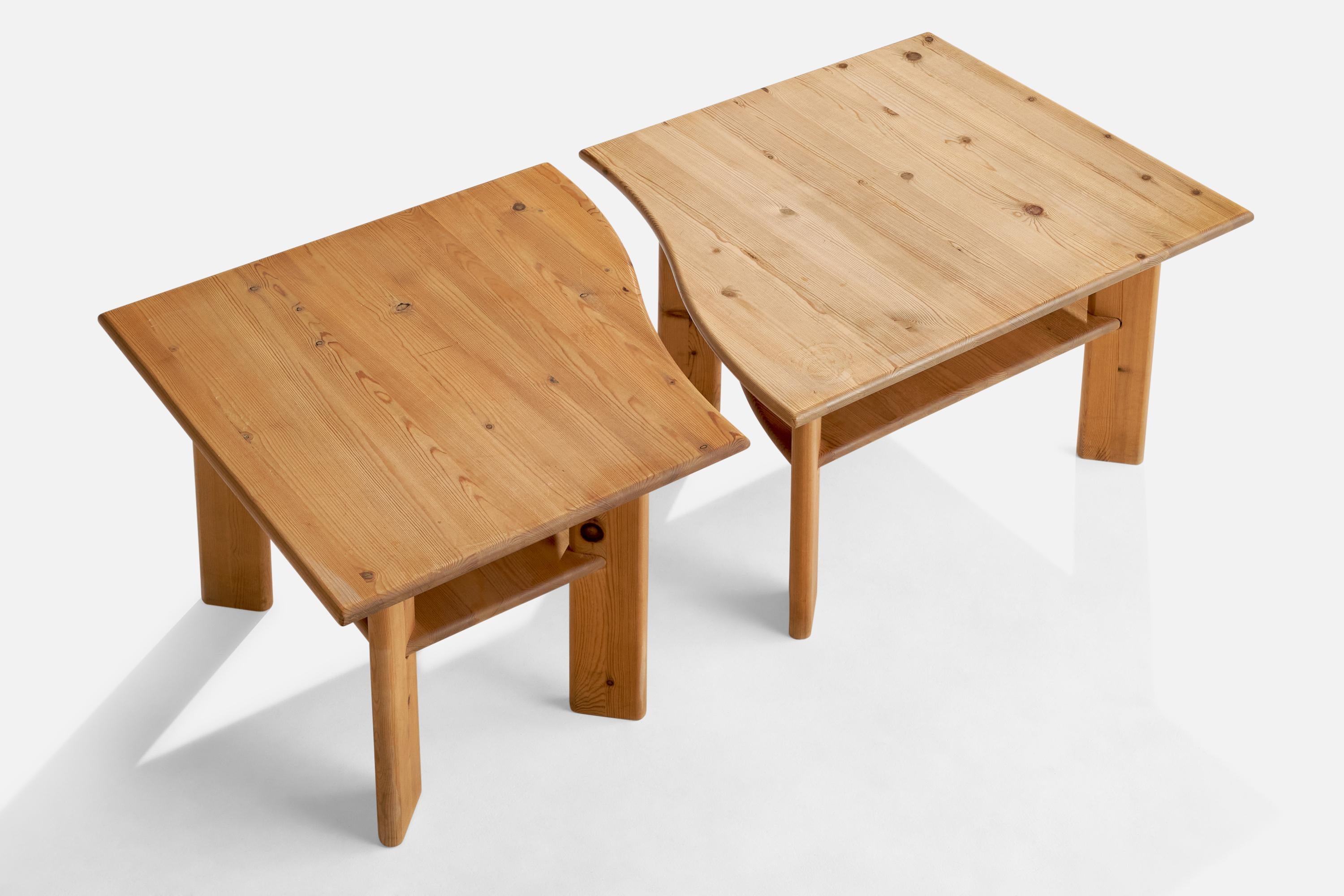 A pair of pine side tables or coffee tables designed by Aksel Kjersgaard and produced by Odder, Denmark, 1970s.

Dimensions of first half 
19.5” H x 35” W x 27.5” D

Dimensions of second half 
19.5” H x 27.25” W x 27.5” D