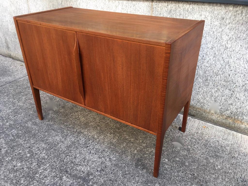 Elegant small teak 2 doors cabinet by Aksel Kjersgaard produced by Odder Møbelfabrik, Denmark, circa 1960
Very good condition, signed in the back
Measures: W 78 x D 37 x H 60 cm.


 