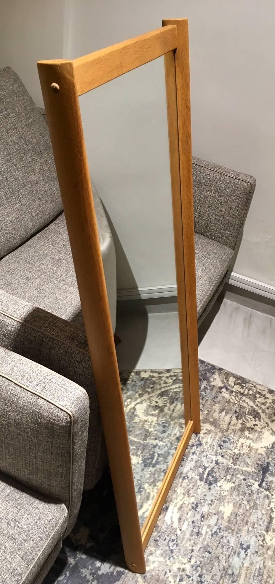 Scandinavian Modern Mid-Century rectangular mirror with oak frame, designed by Aksel Kjersgaard. Manufactured in Odder, Denmark.