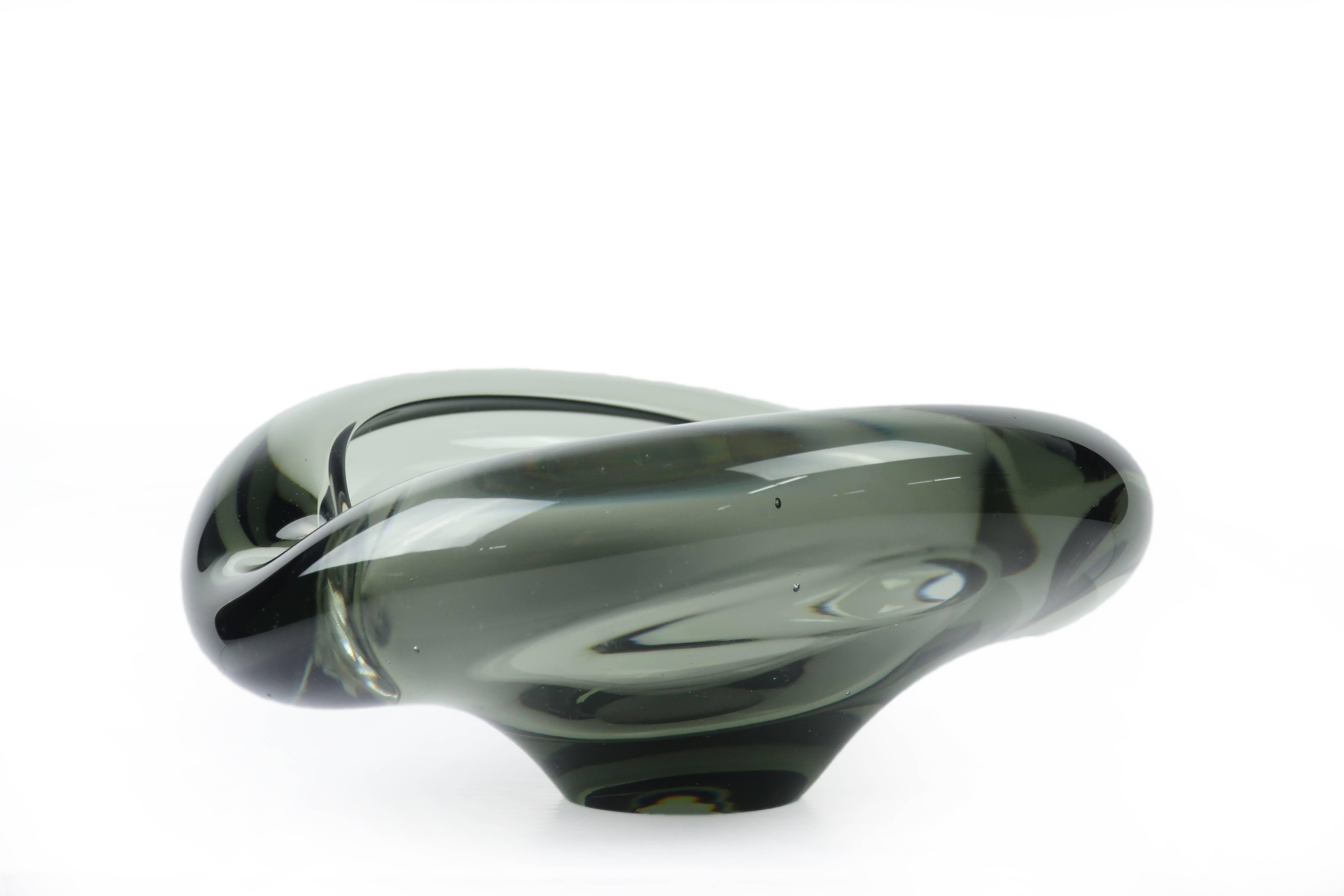 This aqua blue glass ashtray was designed by Per Lütken and produced at Holmegaard, the great Danish glass company. Part of the Akva series, which remained in production from 1953 to 1974, this ashtray (or bowl if you’re not a smoker) is handblown