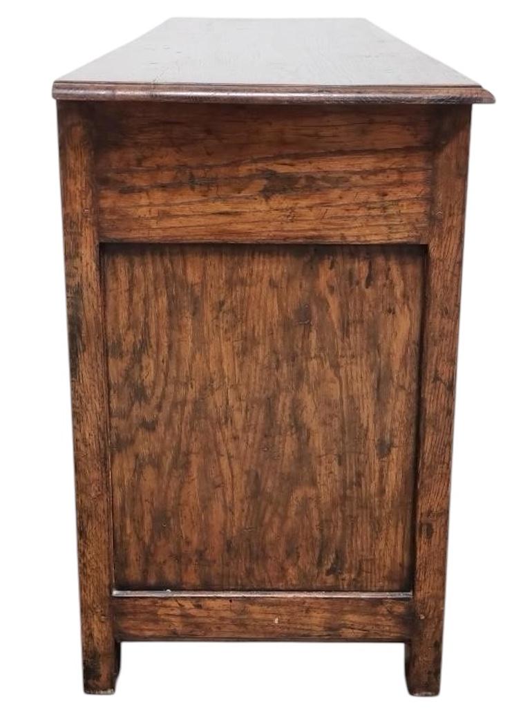 Quercia Al. Credenza/armadio in quercia firmata Frilot John Hall in vendita