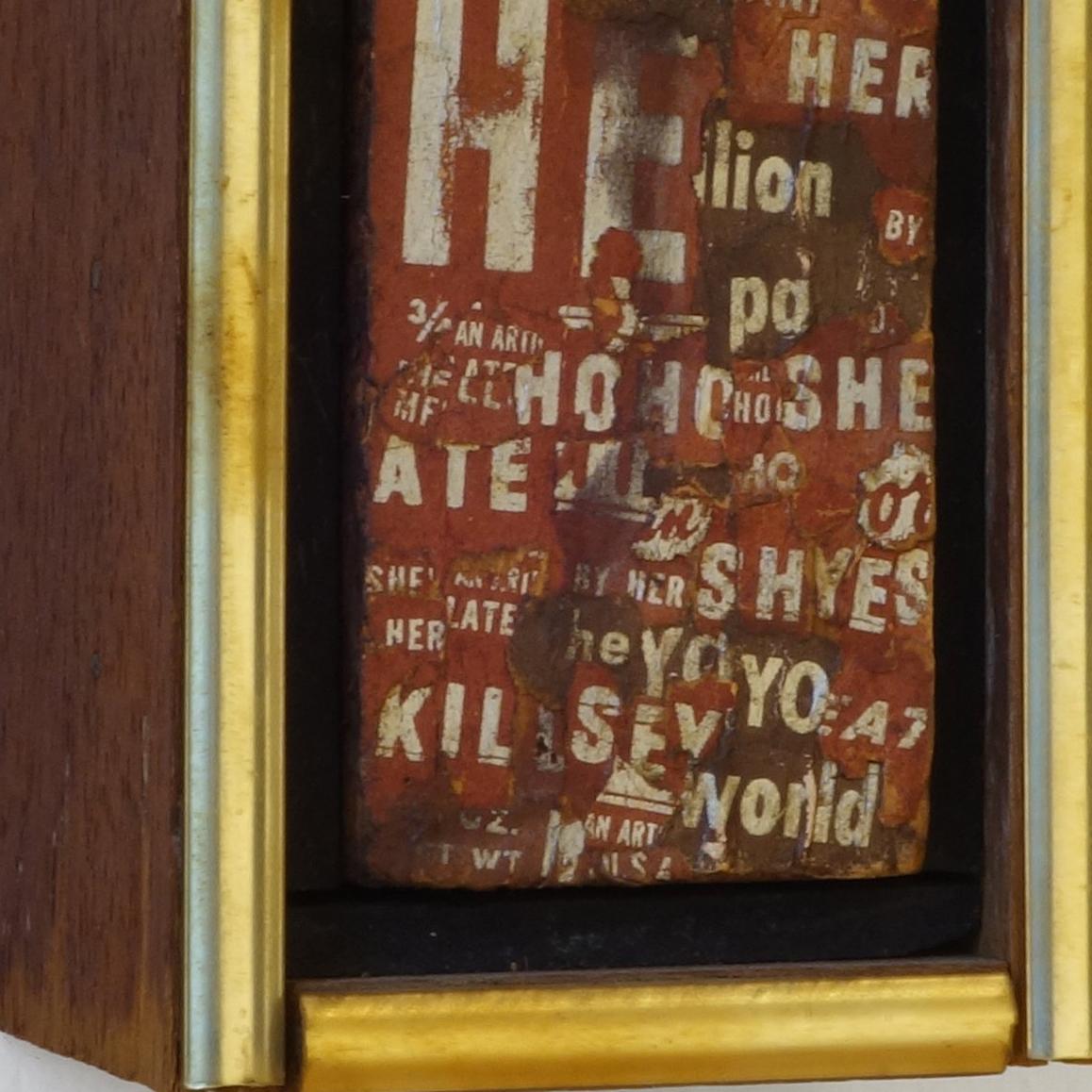 Hershey wrappers on wood with original artist frame. Hansen created collages and found object assemblages made from burnt matches, cigarette papers and text ripped from Hershey Bar wrappers.