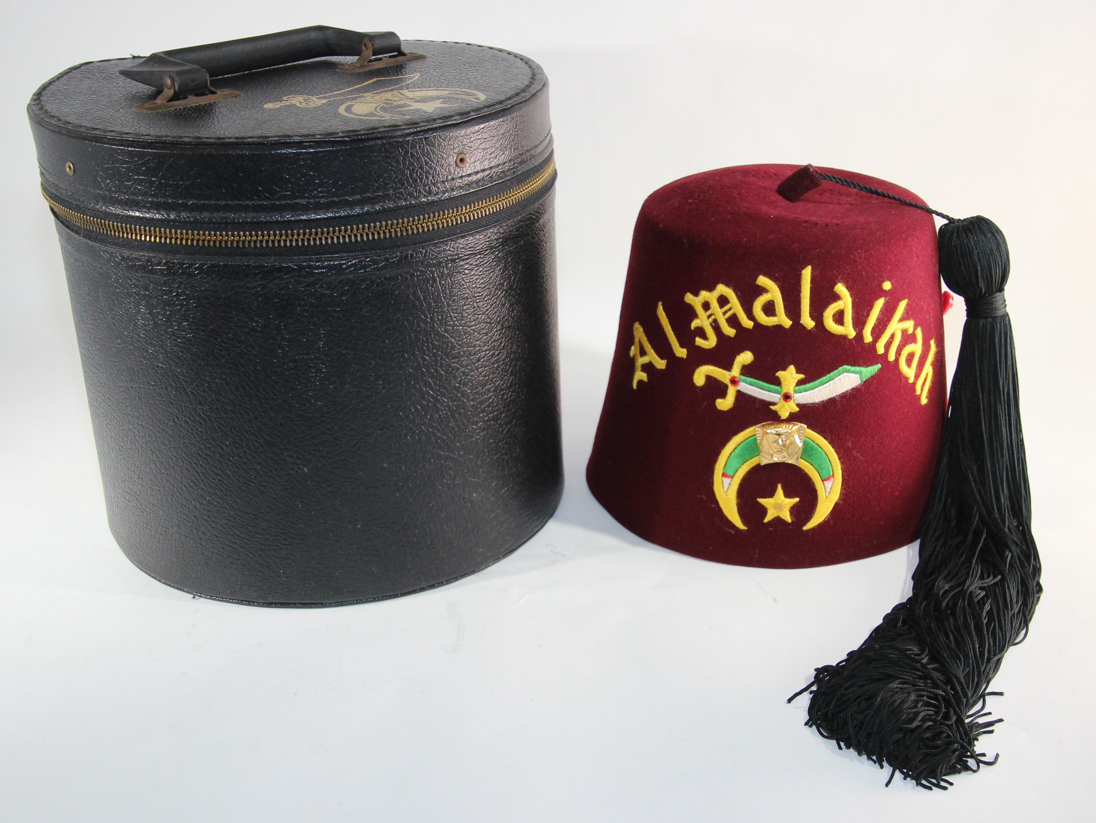 AL Malaikah vintage Masonic Shriner iconic burgundy wool Fez hat with original box. Al Malaikah, legion of Honor vintage fez hat from the Los Angeles Al Malaikah Shriner masonic lodge. This vintage Al Malaikah Shriner's fez in burgundy felt wool