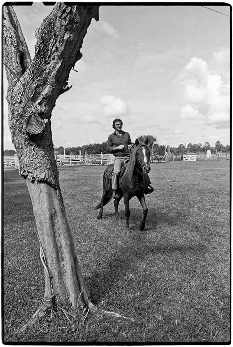 Al Satterwhite Black and White Photograph - Burt Reynolds, at his ranch, Jupiter, Florida, 1972