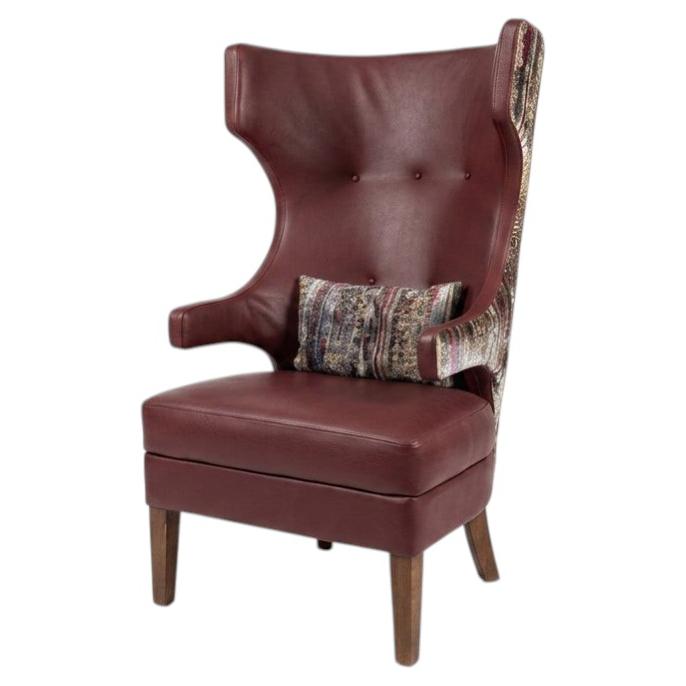 Ala – Fauteuil lounge avec dossier enveloppant en cuir en vente