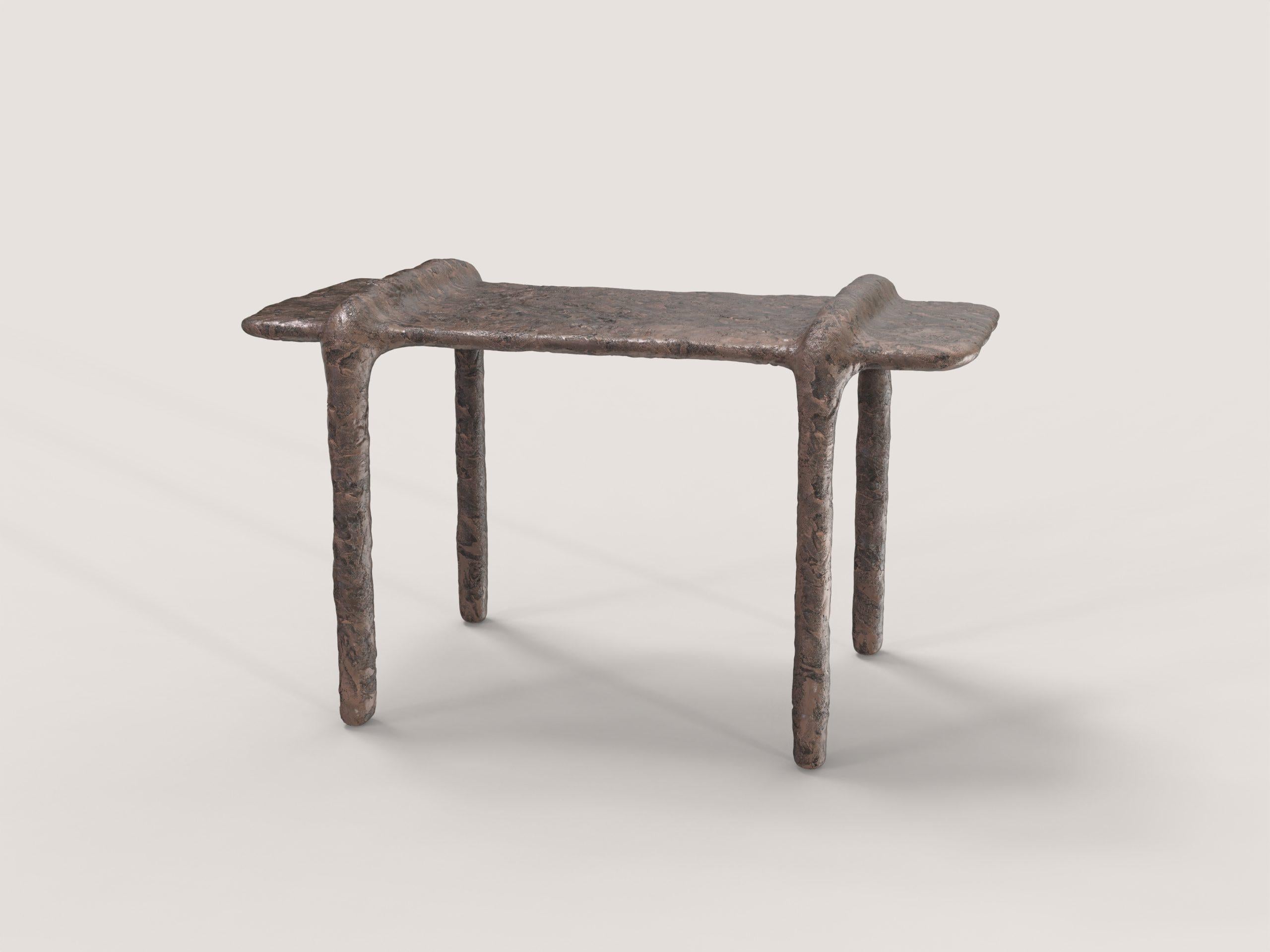 Ala V1 low table by Edizione Limitata
Limited Edition of 150 pieces. Signed and numbered.
Dimensions: D 38 x W 71 x H 43 cm.
Materials: cast bronze.

This low table also can be used as a stool. Please contact us.

Edizione Limitata, that is