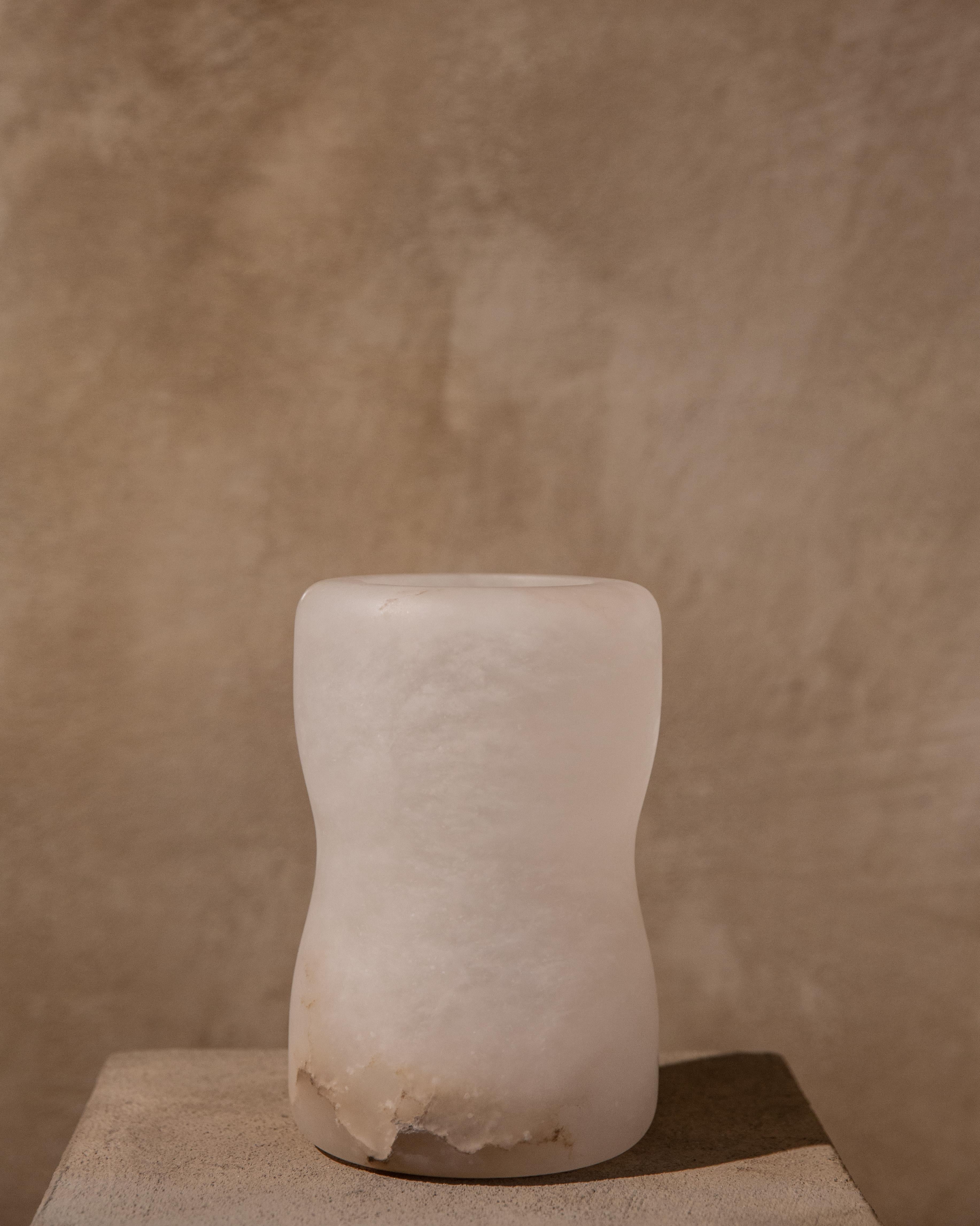 Ala vessel by Karu
Dimensions: D 10 x H 15 cm
Materials: alabaster.

Contemporary vessels inspired by Etruscan Antiquity.
Handcrafted in the hills of Tuscany.

Award-winning design firm Karu debuts its latest limited edition home accessories