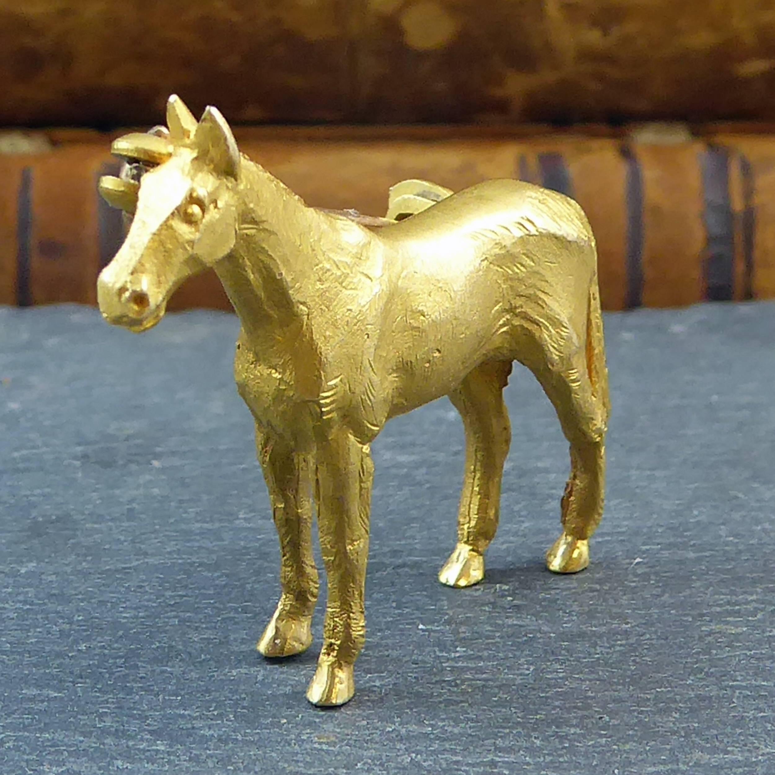 A beautifully modelled horse brooch from the renowned Alabaster and Wilson company, makers of fine equestrian jewellery for over a century and the goldsmiths chosen to create a specially commissioned racing design to mark Her Majestey Queen