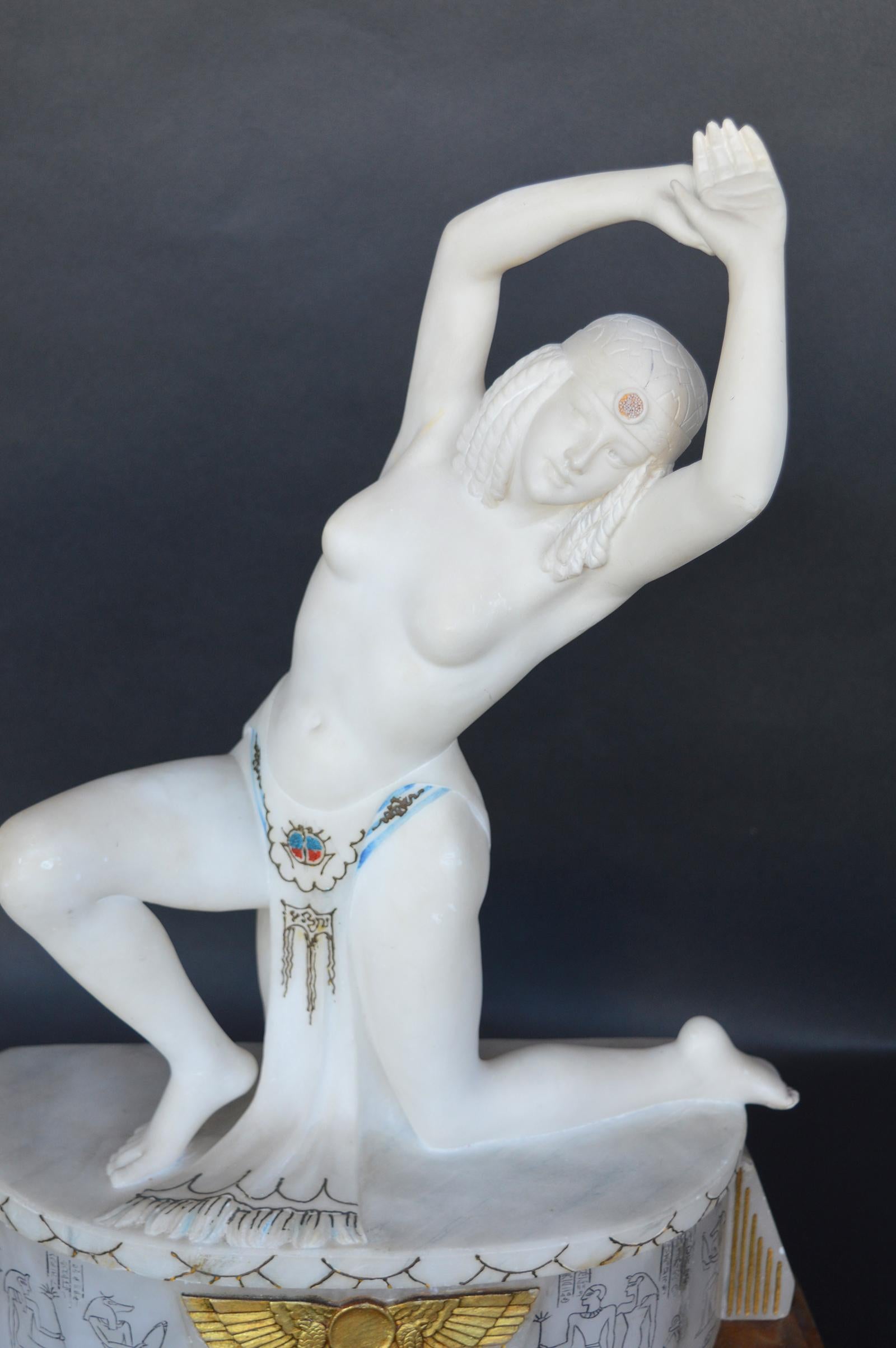 Egyptian inspired Art Deco dancer. Made of Alabaster on an onyx base. The base of the dancer lights up.