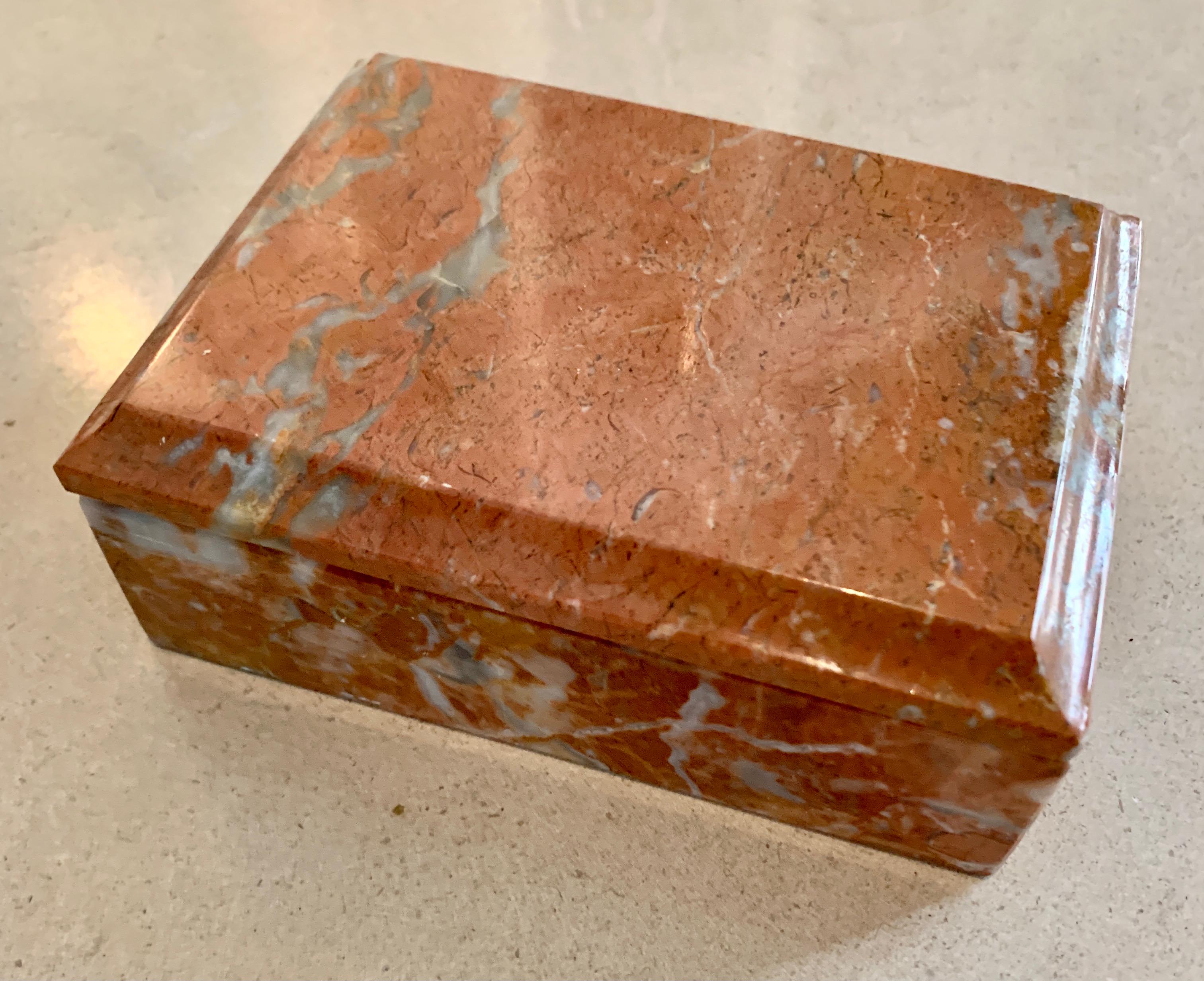 A wonderful Italian Alabaster box with custom lid. The piece is a compliment to any desk, vanity, work station, or cocktail table. The box is a wonderful decorative piece holding everything from trinkets, to paper clips to 420. A nice birthday gift,