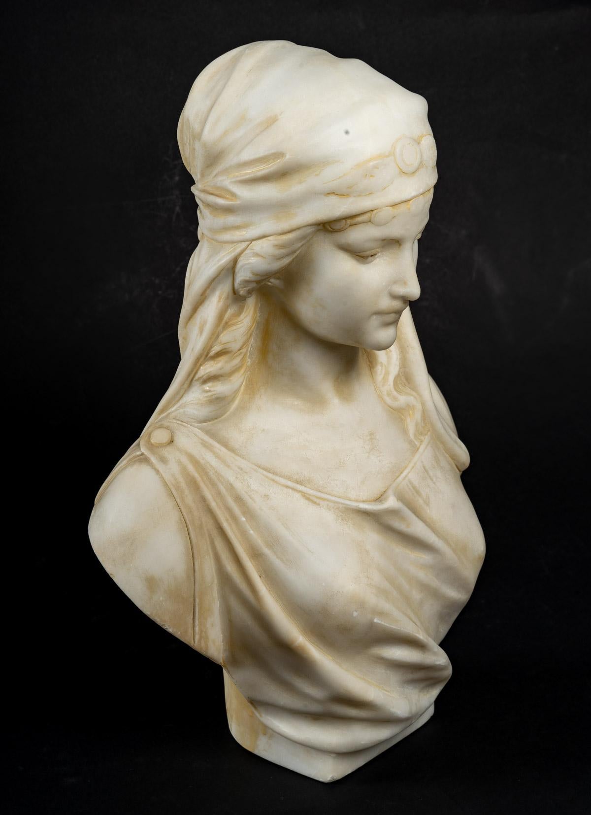 Alabaster bust of a woman by Guglielmo Pugi
Alabaster bust of a woman by Guglielmo Pugi (1850 - 1915).
Measures: H: 35 cm, W: 24 cm, D: 8 cm.
 