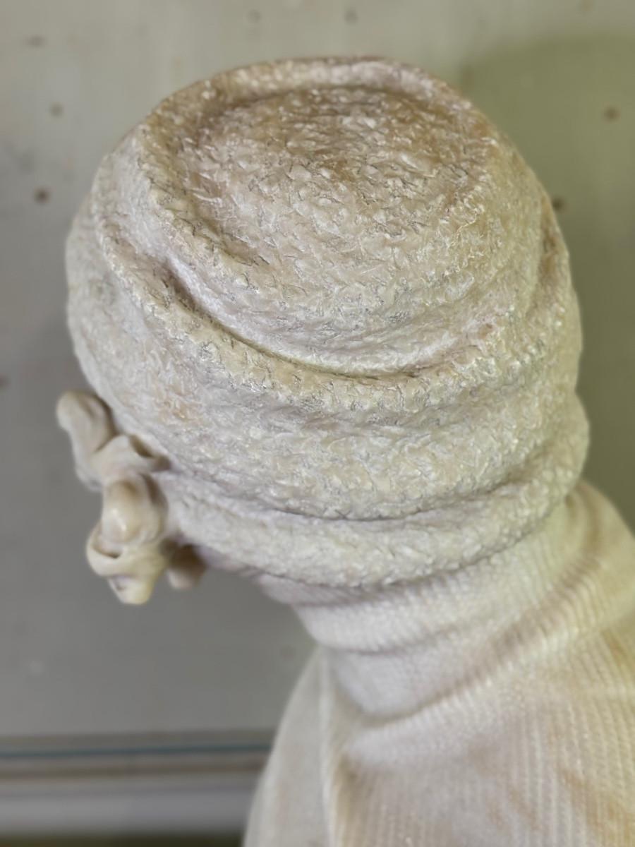 20th Century Alabaster bust of a young girl wearing a turtleneck, signed Caloni, Italy, circa For Sale