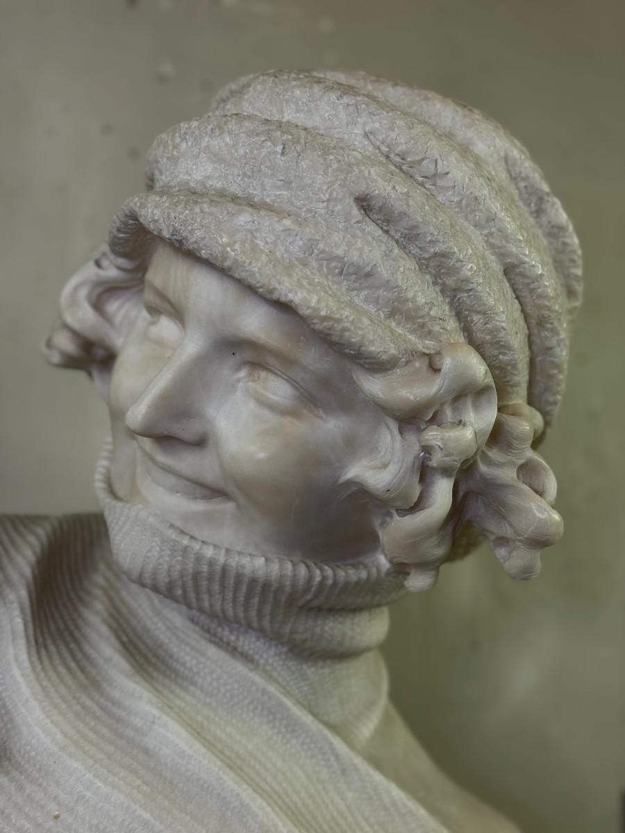 Alabaster bust of a young girl wearing a turtleneck, signed Caloni, Italy, circa For Sale 1