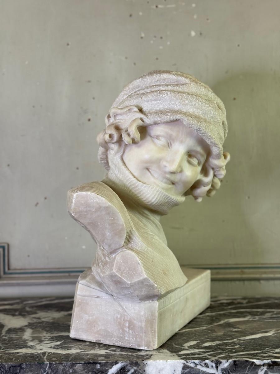 Alabaster bust of a young girl wearing a turtleneck, signed Caloni, Italy, circa For Sale 2