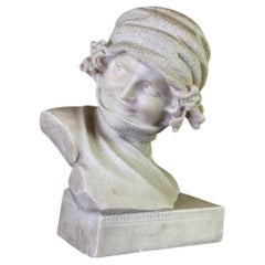 Alabaster bust of a young girl wearing a turtleneck, signed Caloni, Italy, circa