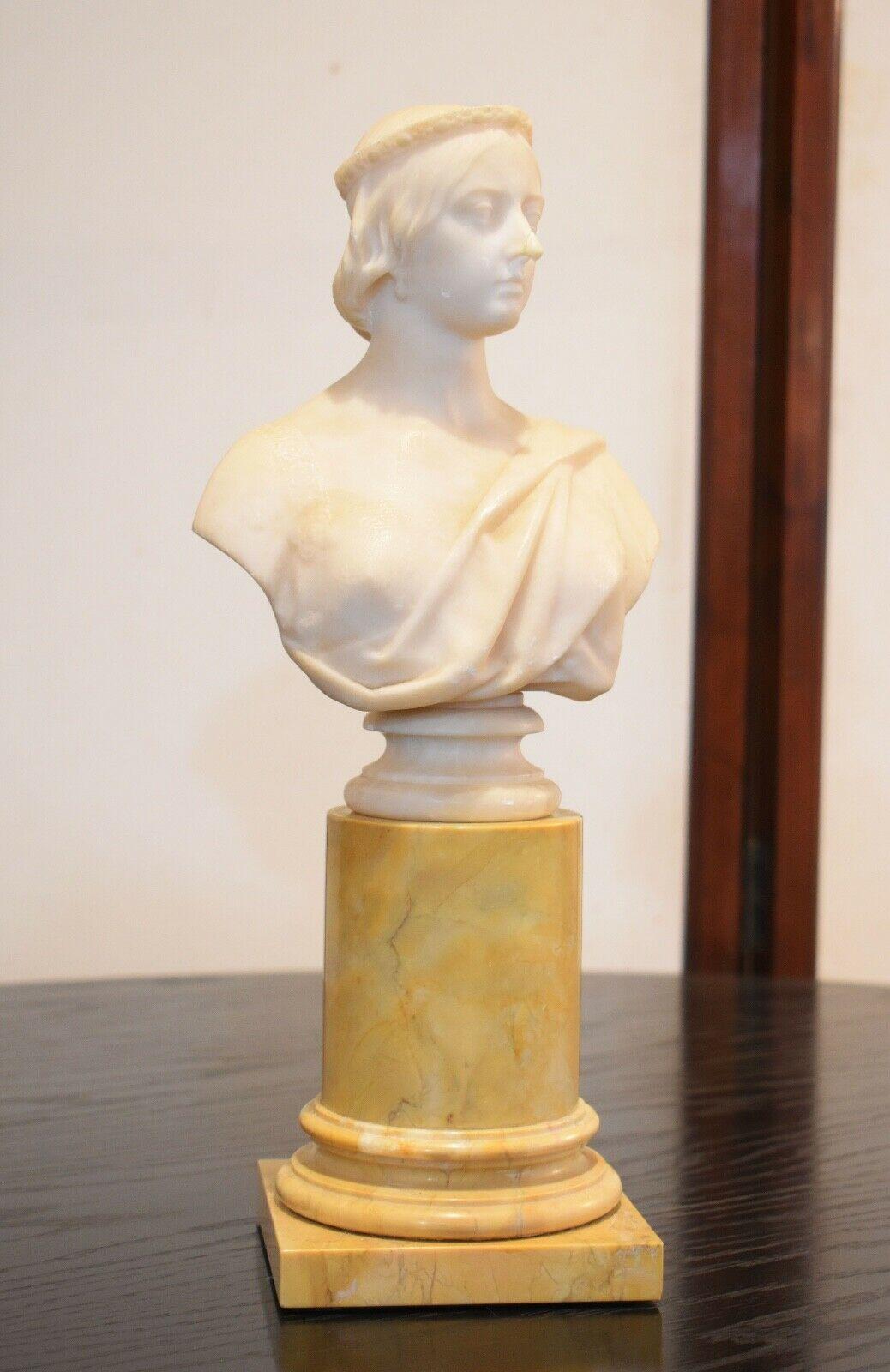 A beautiful bust of Queen Victoria made from Alabaster and set on an Ochre marble column attributed to Matthew Noble.