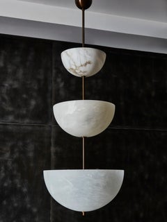 Alabaster Half Spheres Vertical Suspension by Glustin Luminaires