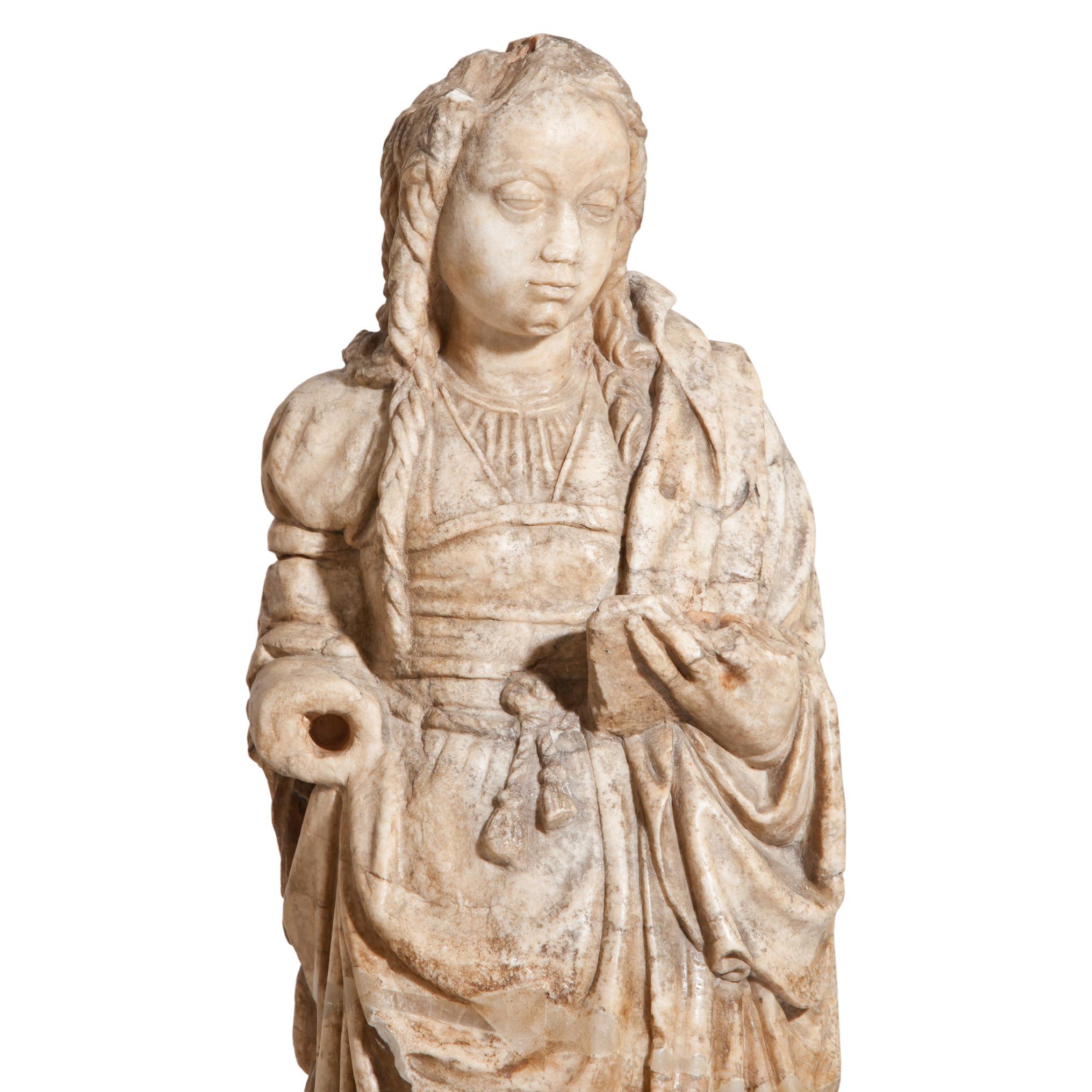 Fully plastic representation of the Madonna in alabaster with finely carved detailing of the drapery of the robe and the hair. Partially damaged and traces of old restoration.
Provenance: The statue comes from the estate of a large noble family in