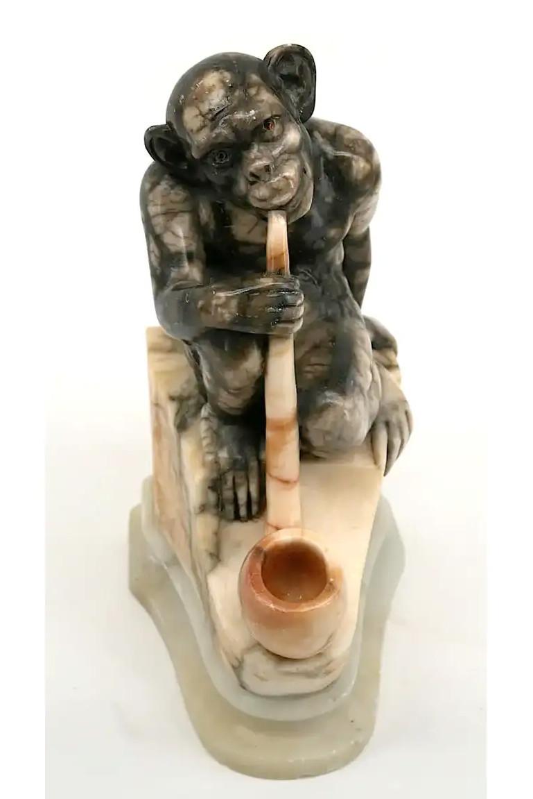 French Alabaster Sculpture, France, Late 19th Century – Monkey Smoking a Pipe. This delightful French alabaster sculpture, created at the end of the 19th century, depicts a monkey leisurely smoking a pipe. The sculpture is crafted in alabaster, with