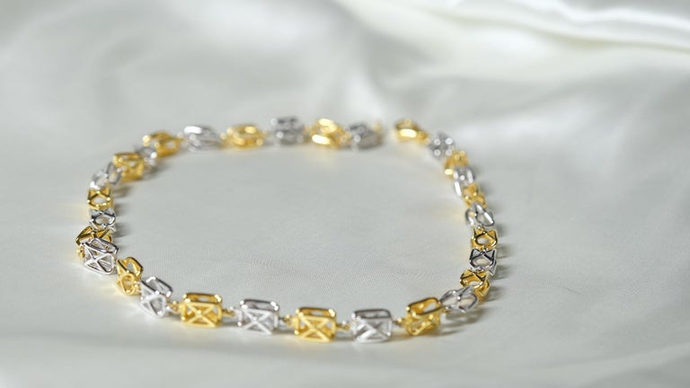 Aba Sterling Silver Necklace plated in 18K Gold with White & Red Stones