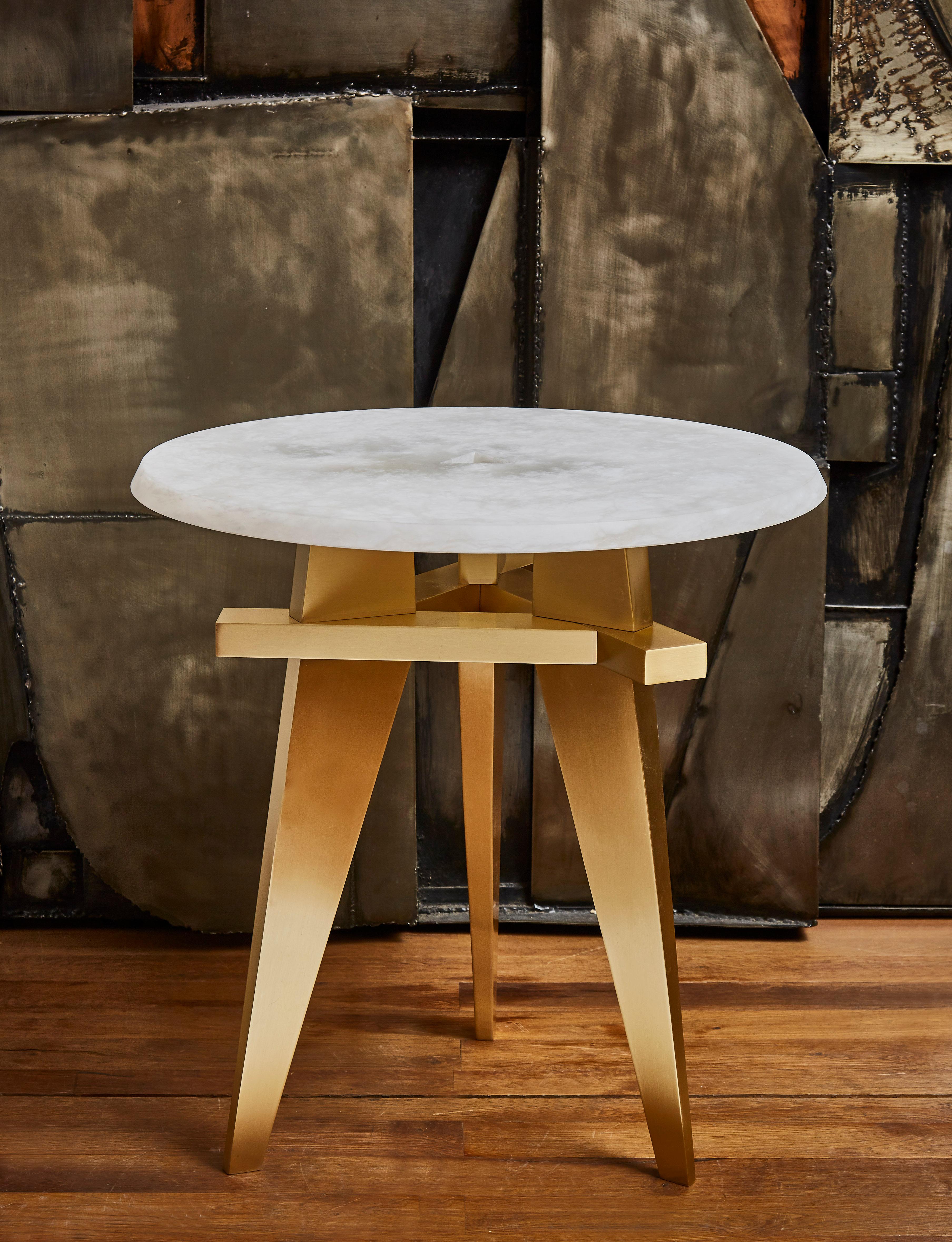 Brass pedestal table with alabaster top. Creation by Studio Glustin.
