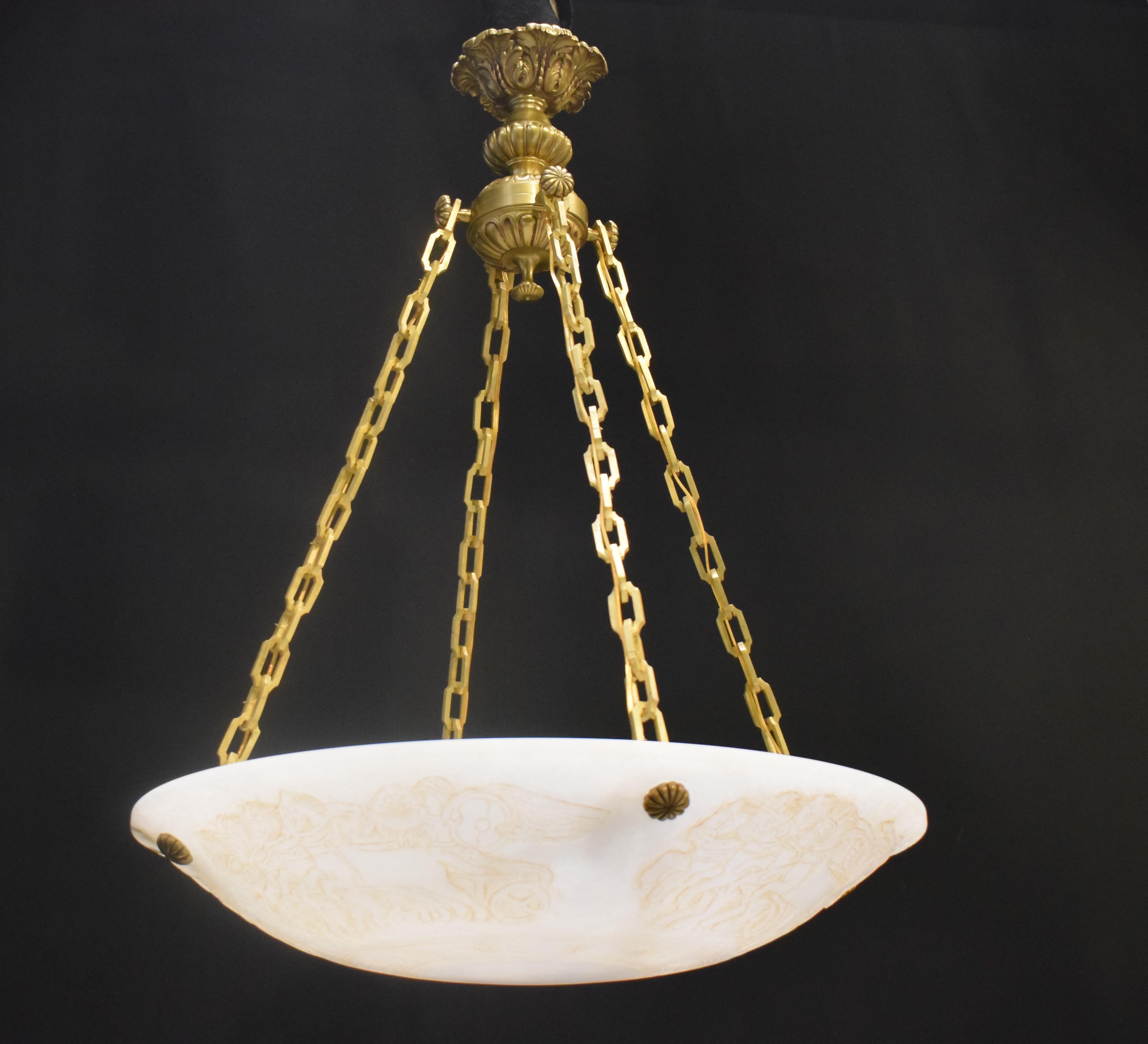 A very fine gilt bronze and hand carved Alabaster pendant. 4 lights. 
Dimensions: Height 39