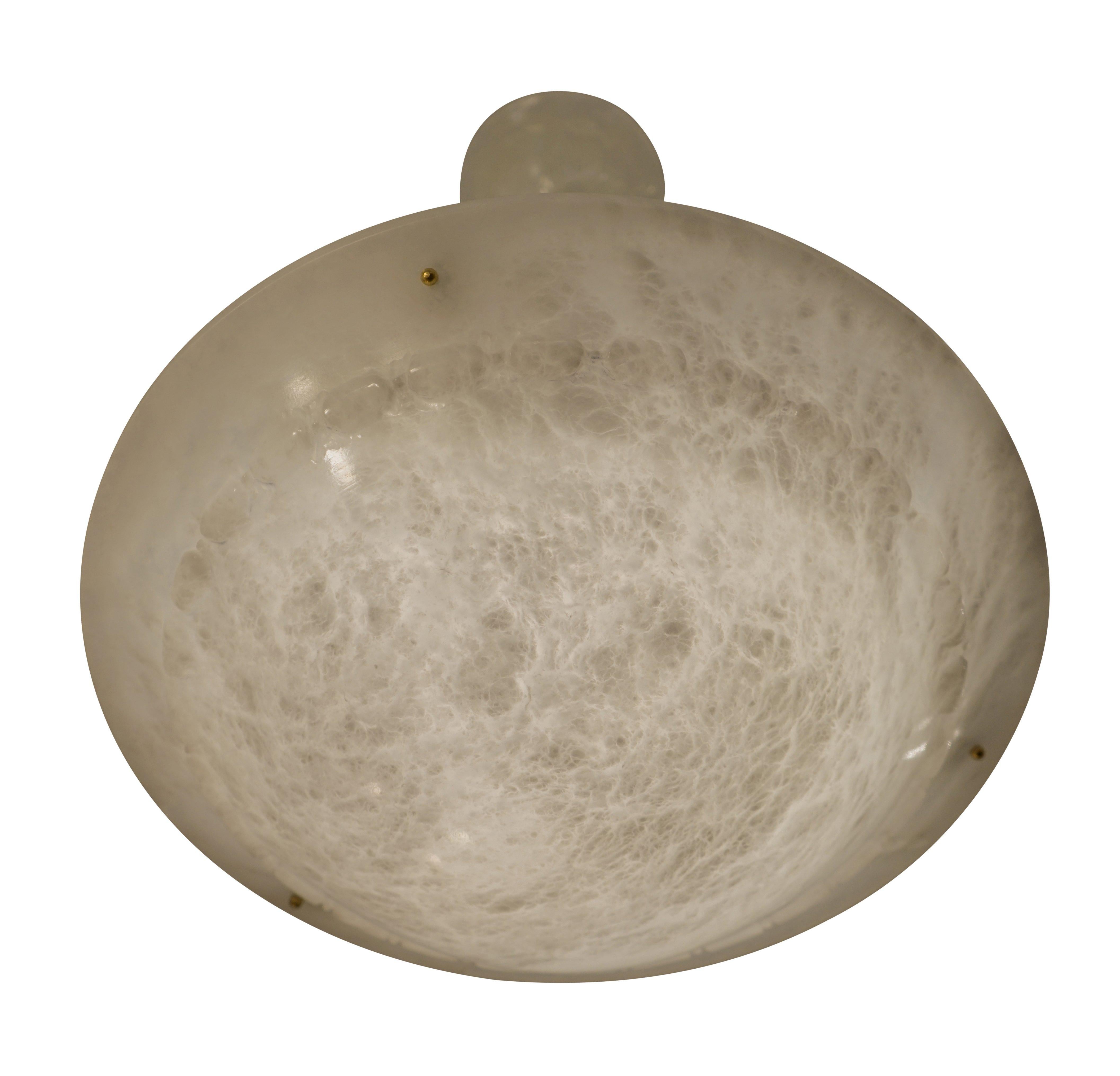 With matching canopy, suspended from gold cords this ethereal light fixture will light up the darkest of days. Thorough mineralization occurs throughout the stone with a carved ring of pearls midway up the curve of both canopy and shade.