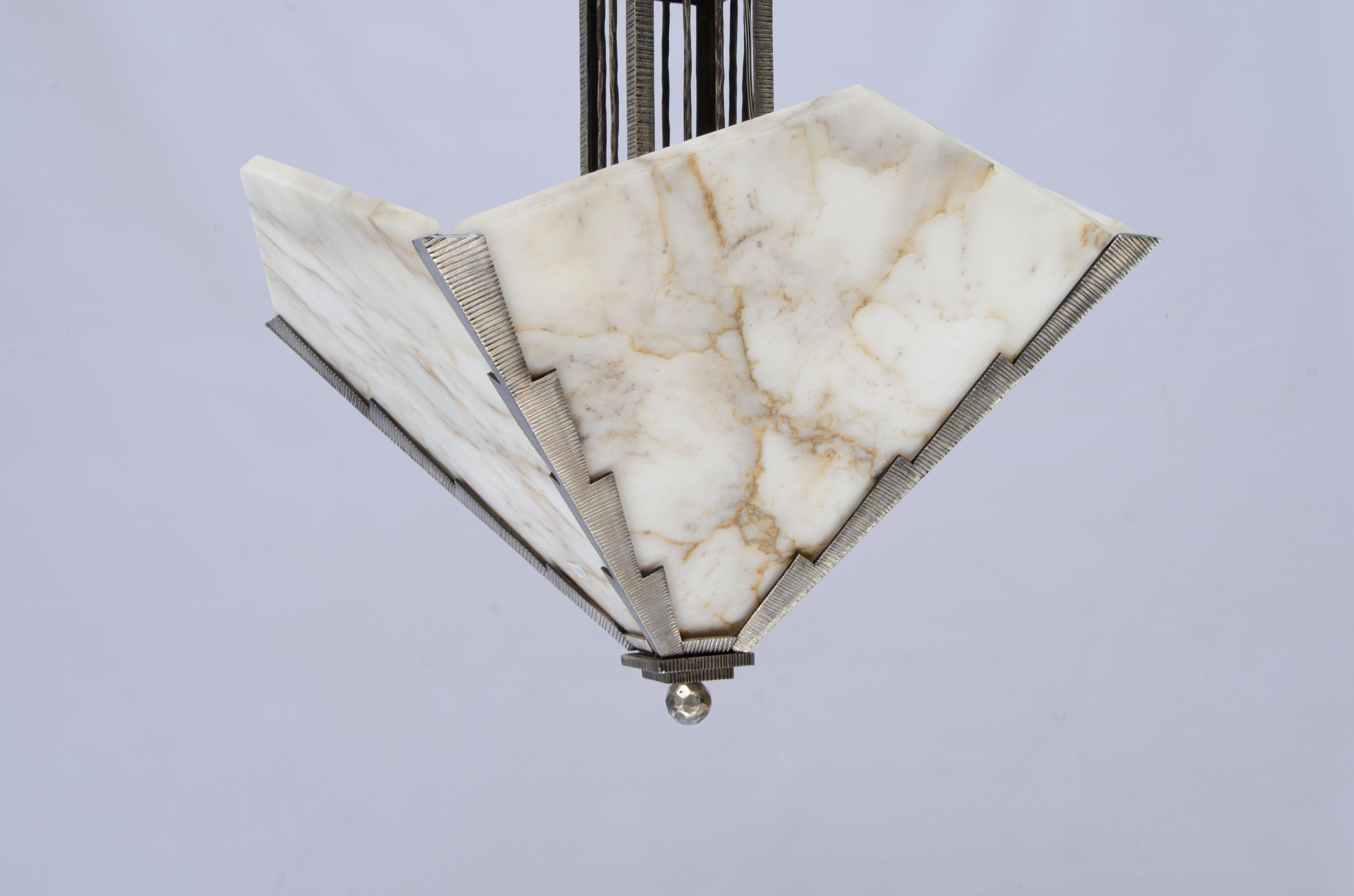 Alabaster pyramid shaped alabaster Art Deco hanging light and silverplated bronze structure.

France, CIRCA 1920.