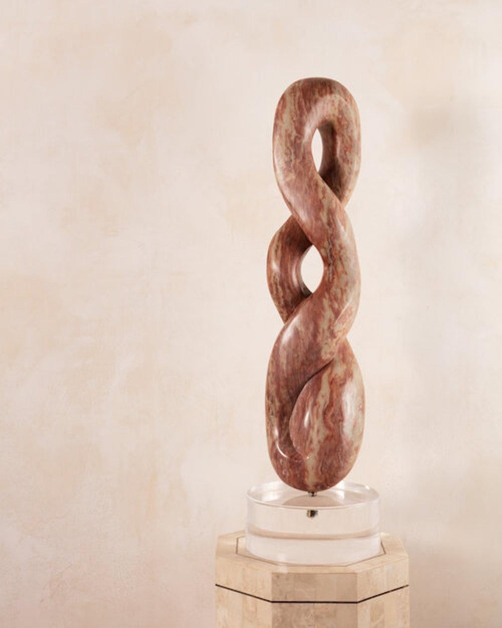 An elegant alabaster sculpture by female artist Pat Epstein (American, 1924-2015). Raised on a Lucite base.

 