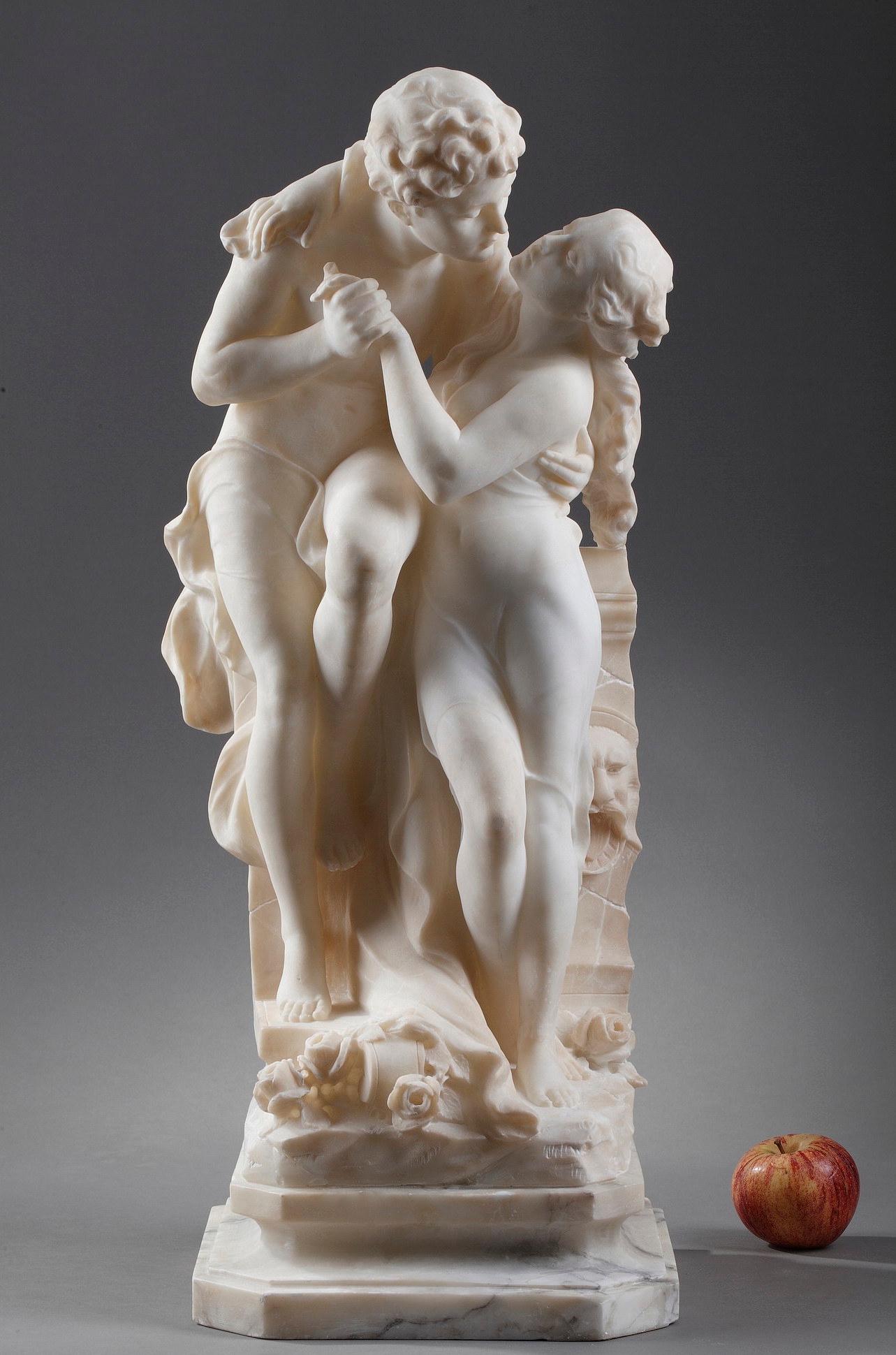 Important statue of a mythological couple in alabaster, signed C. CIPRIANI in hollow at the back. The young couple is leaning against a pilaster decorated with a mask. The two naked lovers are about to kiss. They are dressed with wet effect