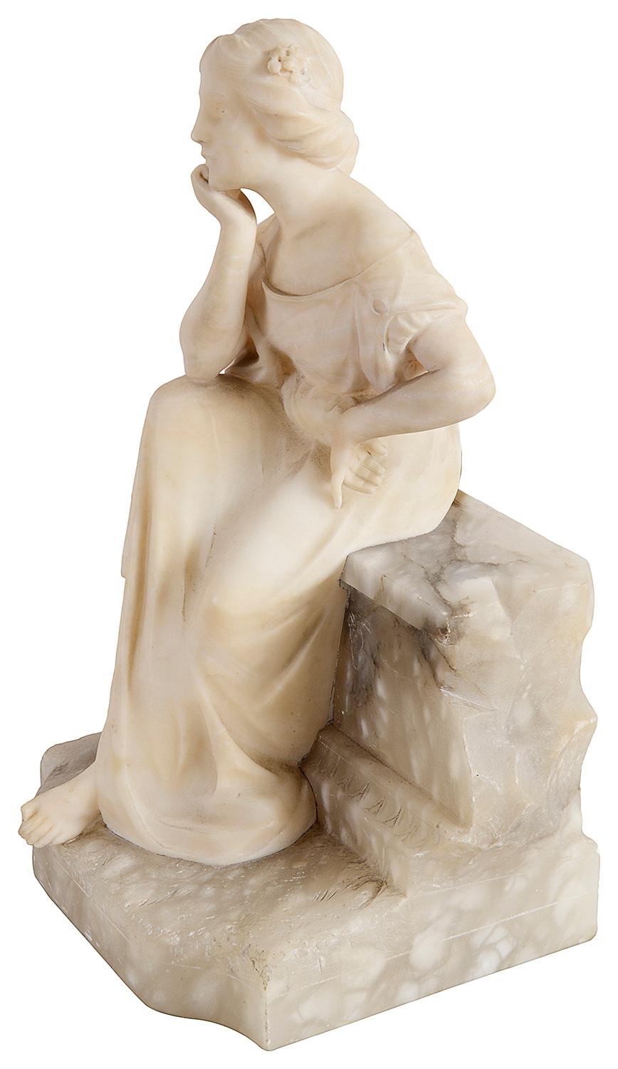 statue of a seated girl