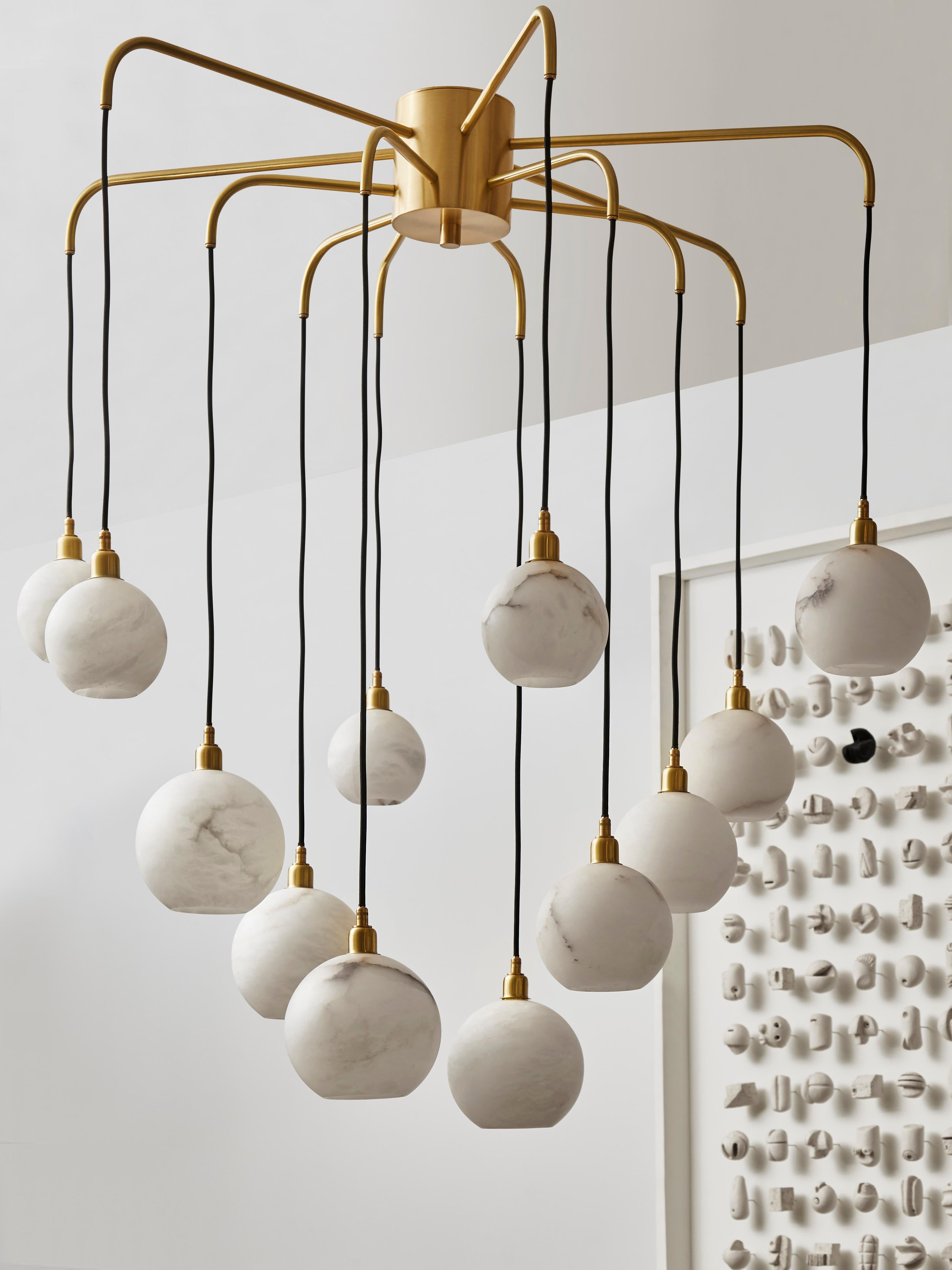Unique brushed brass chandelier with alabaster globes.
Creation Studio Glustin.
France, 2023