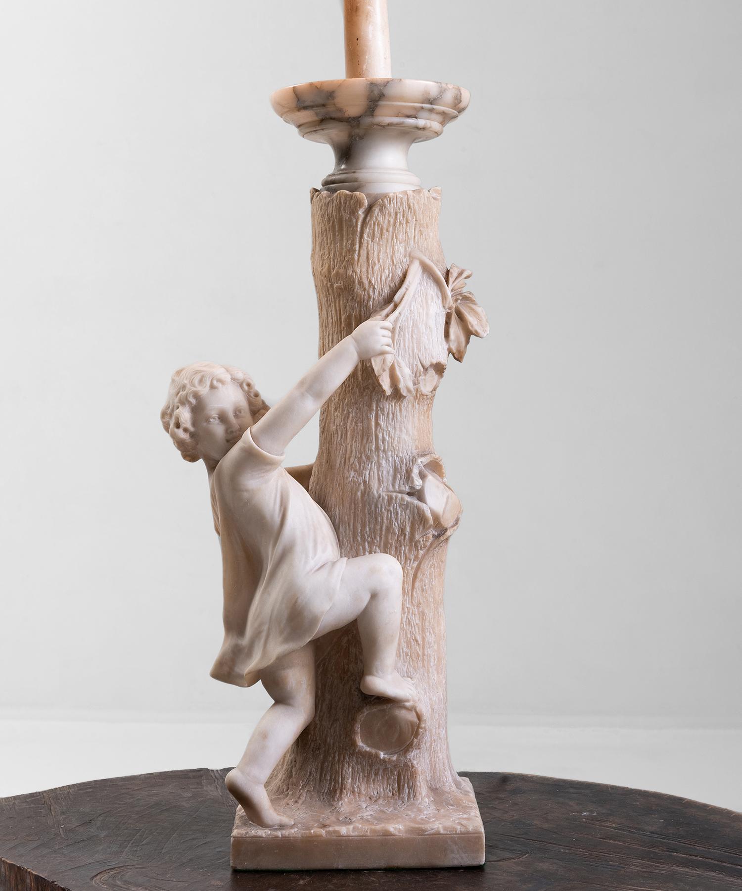 Tall lamp featuring a girl, climbing a tree stump, all carved from the same piece of Alabster. Signed A. Germay.


13”dia x 38”h
     