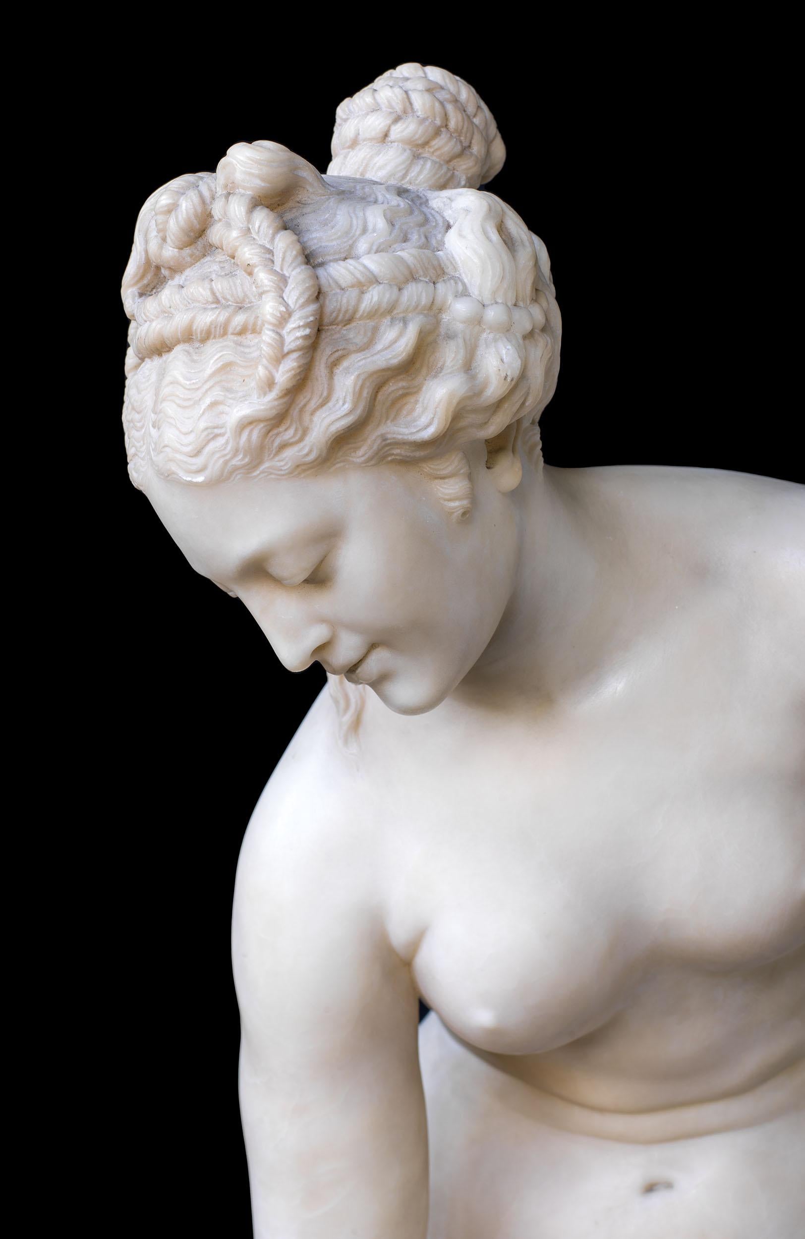 A large and very finely carved figure of Venus Sortant du Bain, or Venus emerging from her bath. This subject has been immensely popular since classical antiquity, and depicts the Goddess drying herself whilst resting her foot on a rock. This statue