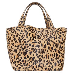 ALAIA 2025 « Le Cabas » : grand sac fourre-tout ouvert sur le dessus, en cuir de veau marron sépia à imprimé léopard