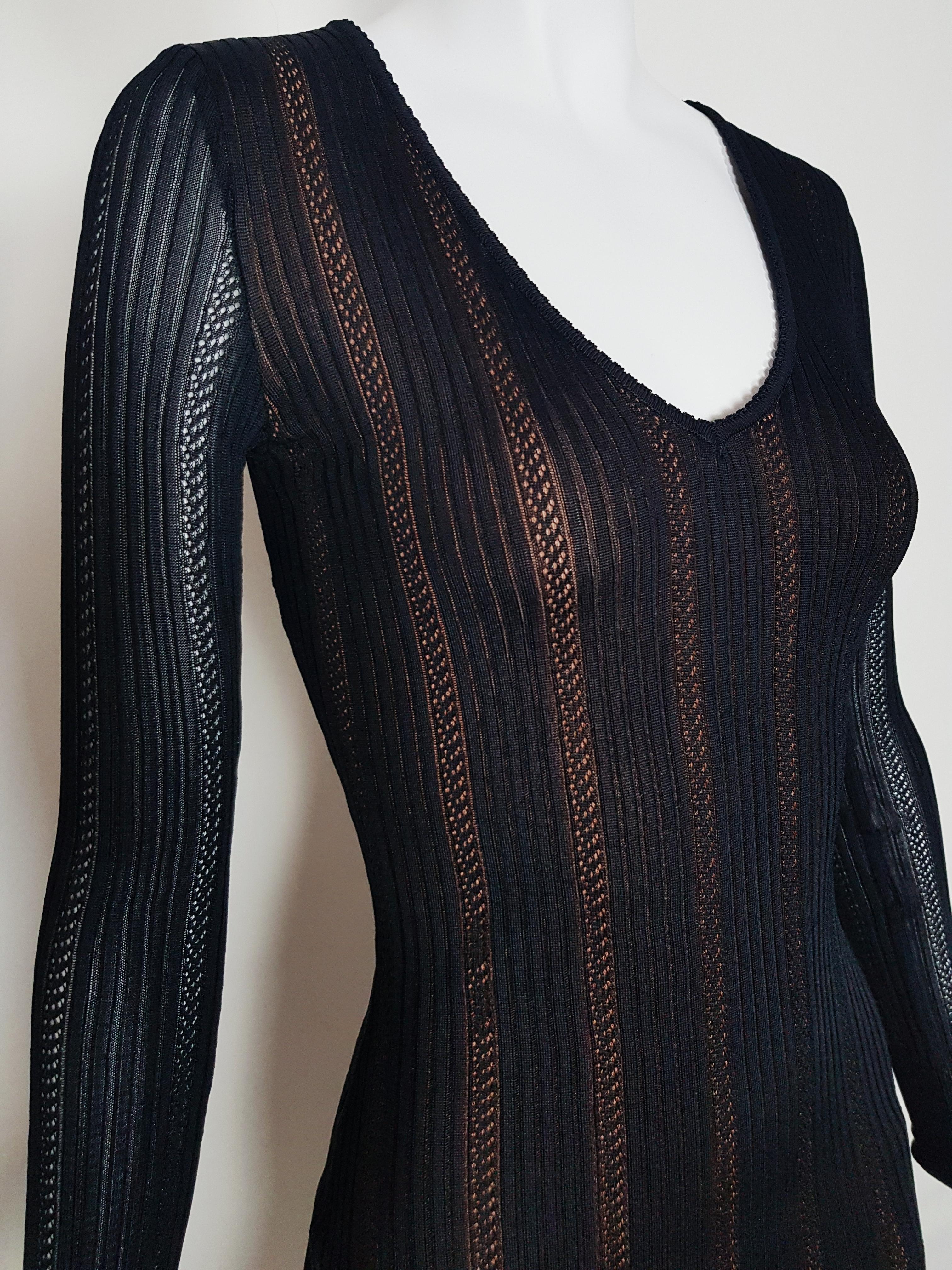 Alaïa knitted mini dress with sheer raised edge skirt

-Back closing with a hidden set zipper
-Long sleeves
-Nude knitted lining
-Made in Italy
-100% Viscose
-Estimated size: 34 FR to 36 FR (marked as XS)
-Very good conditions