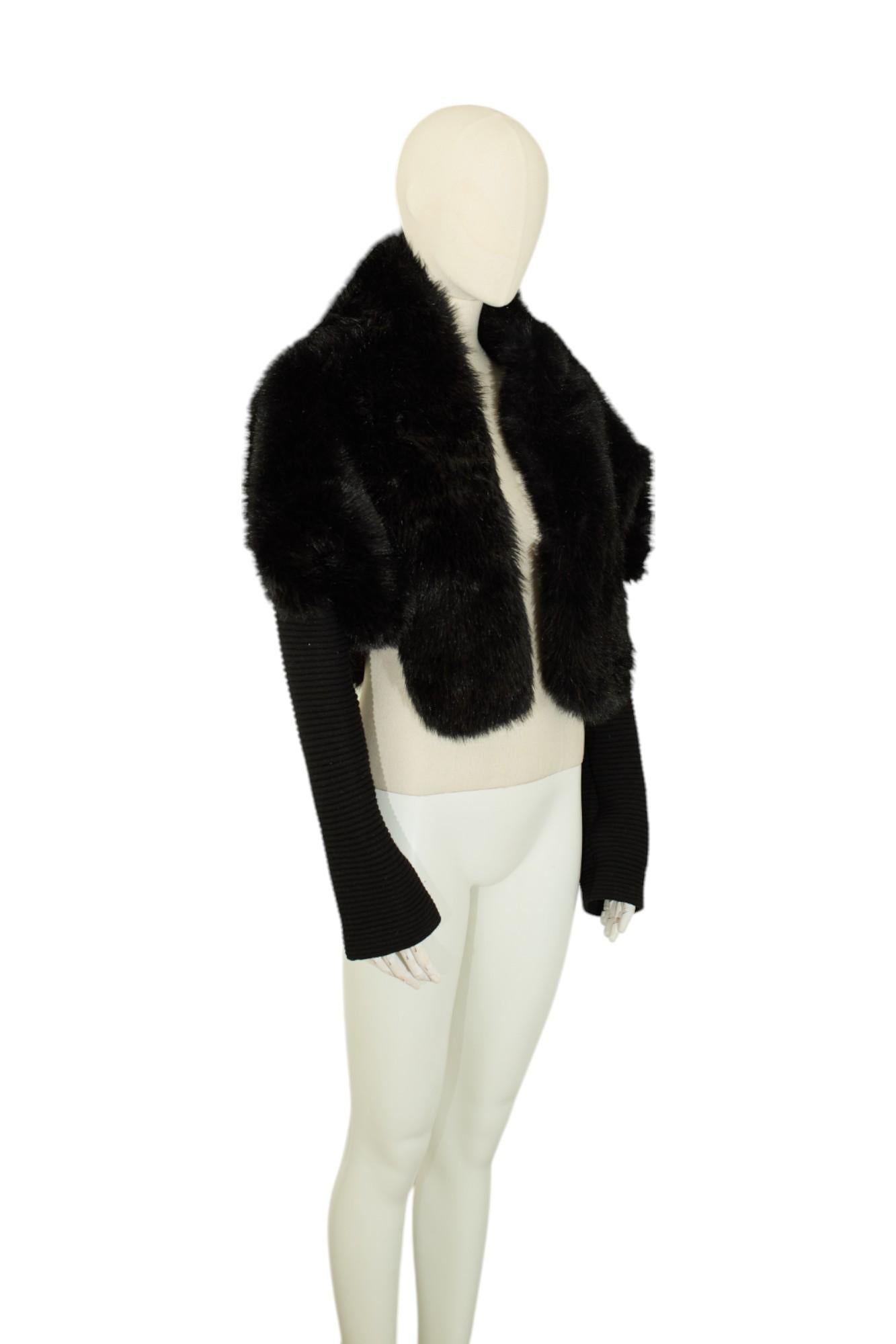 Beautiful Alaiä faux fur bomber jacket in black featuring wool details. Has a minor repair in the lining of the jacket which is not visible when wearing. 

Brand: Alaïa
Period: 90s
Material: Faux fur & Wool
Size: Medium
Origin: Made in