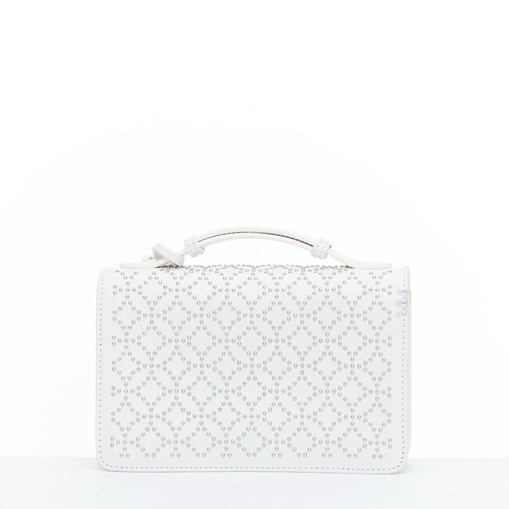 De las mujeres Bolso cruzado ALAIA Arabesque Franca blanco con tachuelas de plata en venta