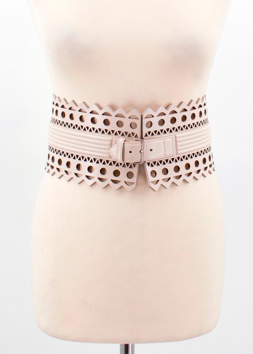 Alaia beige leather waist belt. 
Made in Italy. 

Waist belt. 
Features an adjustable buckle. 

Fabric: Leather. 

Please note, these items are pre-owned and may show signs of being stored even when unworn and unused. This is reflected within the