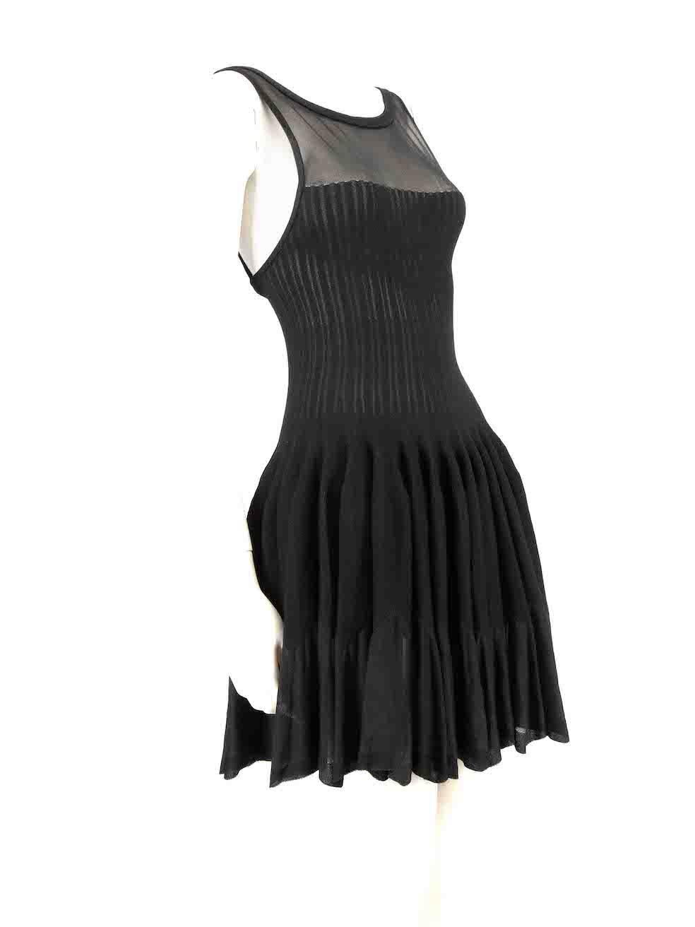 CONDITION is Very good. Minimal wear to dress is evident. Minimal wear to the fabric surface with one or two plucks to the weave found over the shoulders and very lights discolouration seen inside the bodice on this used Alaïa designer resale item.
