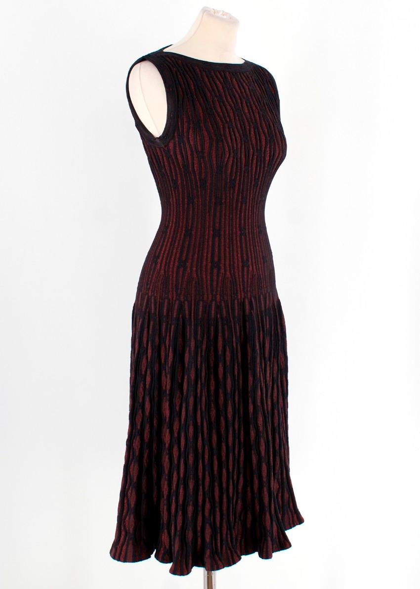 Alaia Flared Knit Dress 

- Sleeveless
- Striped 
- Boat neckline 
- Rear zip fastening
- Fit-to-Flare cut 

Please note, these items are pre-owned and may show some signs of storage, even when unworn and unused. This is reflected within the