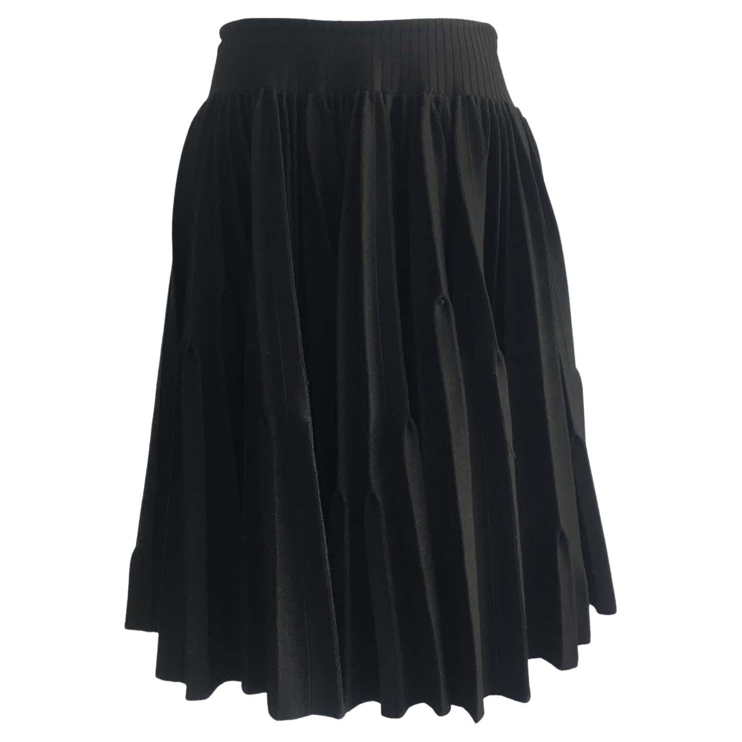 Alaïa black wool base pleated volumed circle skirt with high-rise waist. 
Double pleated design,  very calculated contrasting silhouette.
With Zip fastening at the back. Made in Italy.
Size tag : 38 FR
80% wool, Polyamide 10%, viscose 5% and nylon