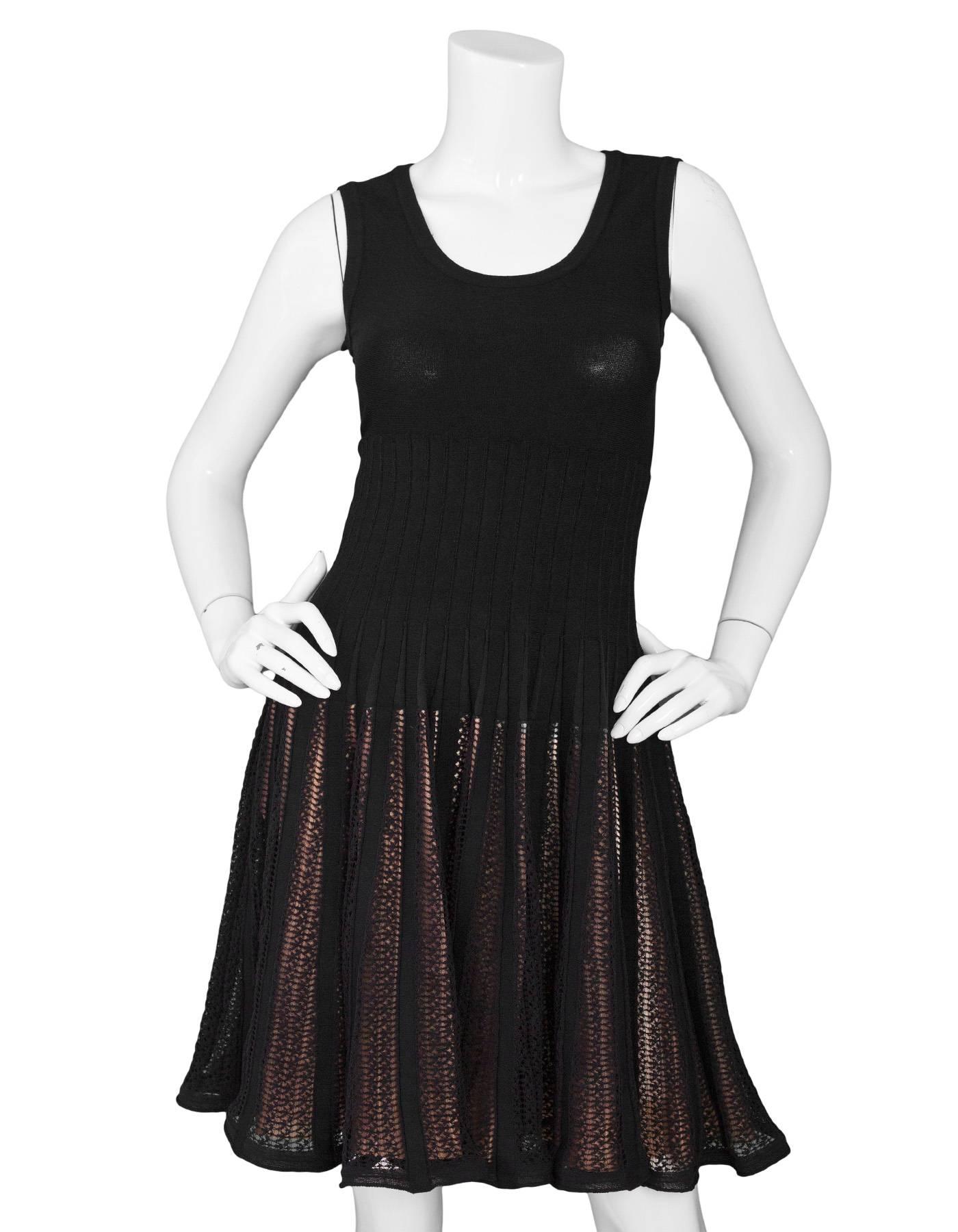 Alaia Black Skater Dress with Nude Underlay Sz FR40

Made In: Italy
Color: Black, nude
Composition: 50% viscose, 20% cotton, 10% silk, 10% nylon, 10% polyester
Lining: Nude underlay at skirt
Closure/Opening: Back zip closure
Exterior Pockets: