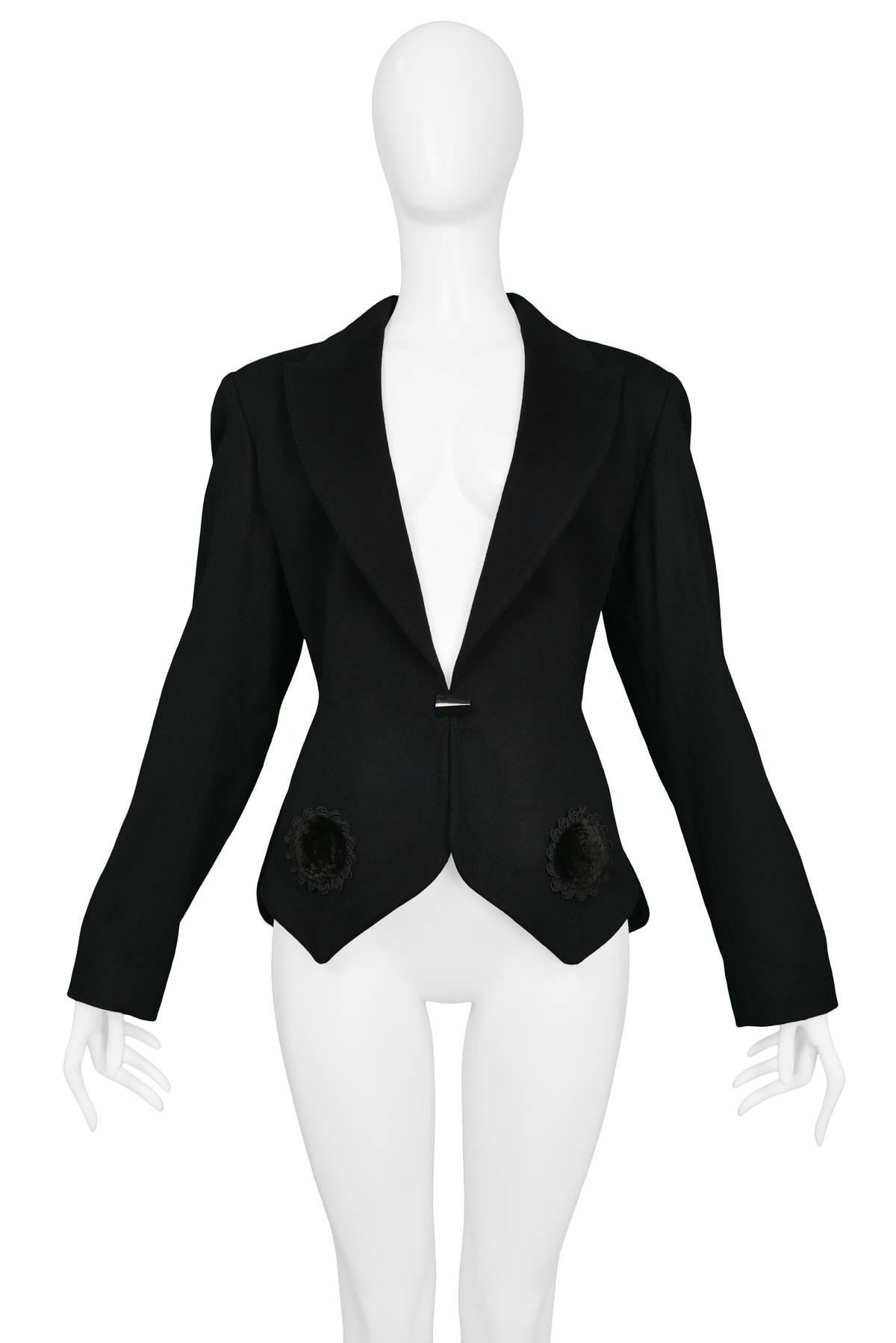 Vintage never worn black Azzedine Alaia wool fitted blazer featuring velvet appliques at hem, classic lapel collar, straight sleeves, and single button closure. Collection 1991.

Condition : Deadstock Vintage

Size : 40
Measurements:
Shoulder