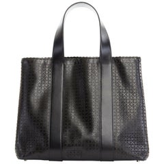 ALAIA black floral perforated leather flat top handle expandable large tote bag