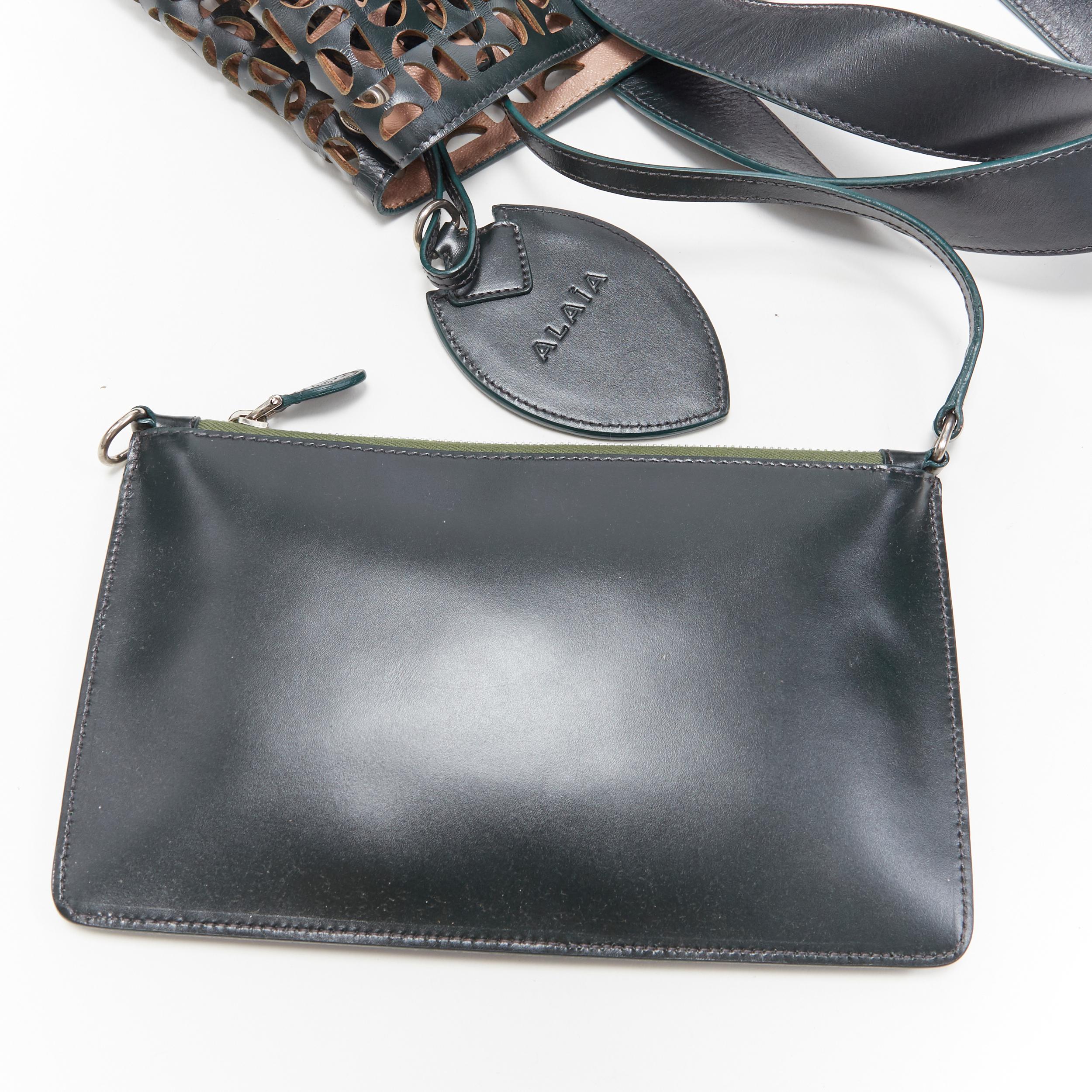 ALAIA black geometric cut out leather expandable sides zip pocket top handle bag 4