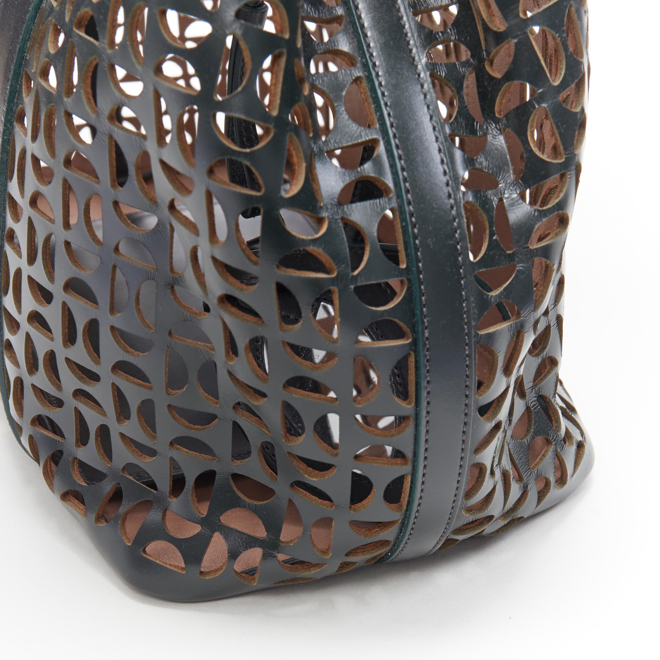 ALAIA black geometric cut out leather expandable sides zip pocket top handle bag 2