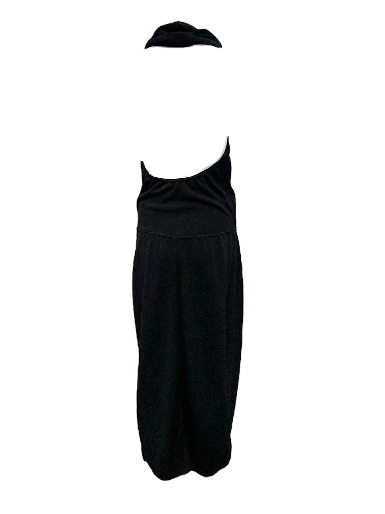 Jaw dropping, show stopping, body hugging, little black ALAIA dress. Luxurious heavy-weight knit. Sexy skin-bearing plunging neckline. Circa 1990s. Unlined, in excellent condition. Size varies slightly due to stretch in the fabric.

Additional