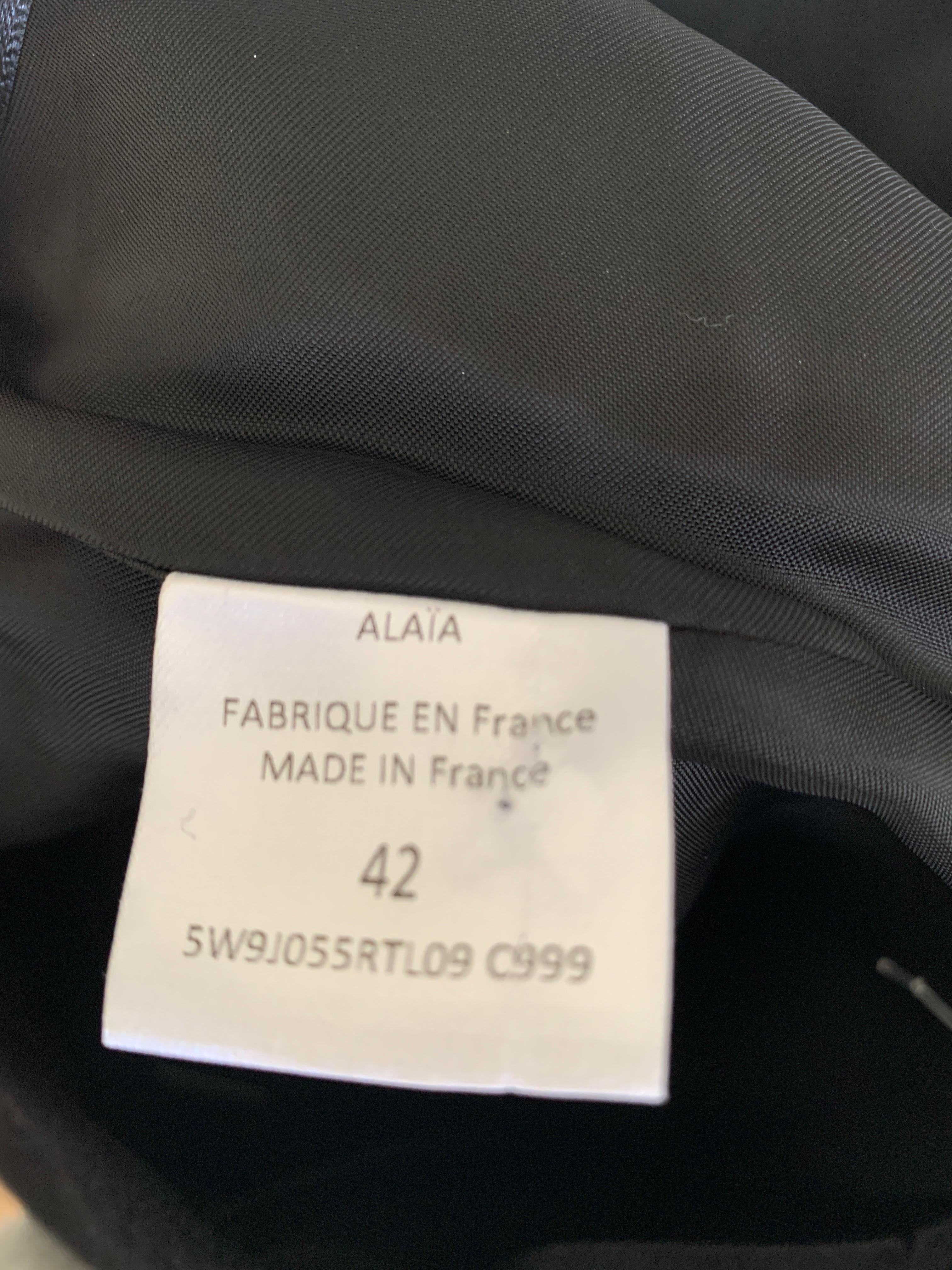 ALAIA Black Knee Length Skirt  In Excellent Condition For Sale In Thousand Oaks, CA