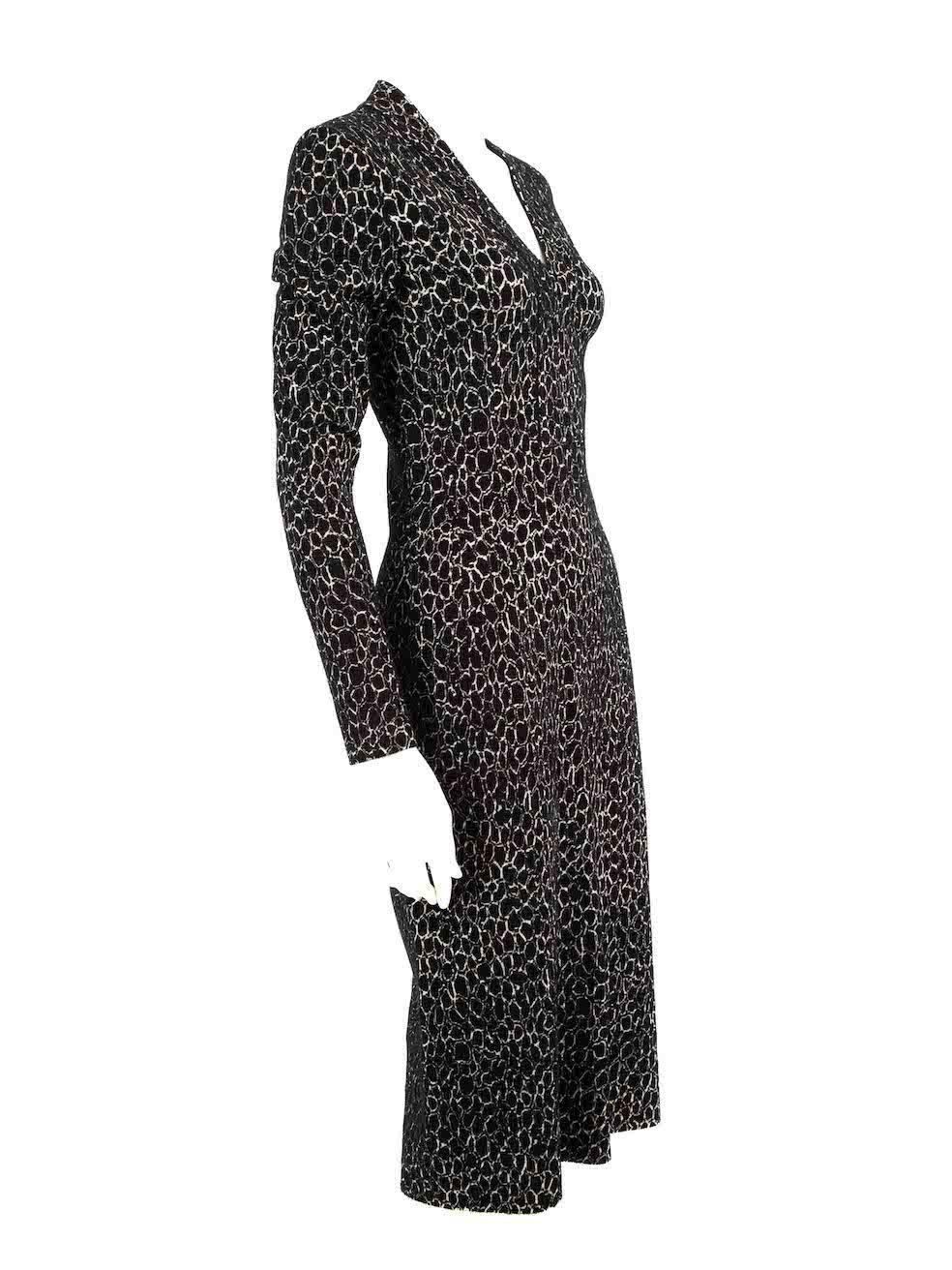 CONDITION is Very good. Hardly any visible wear to dress is evident on this used Alaïa designer resale item.
 
 
 
 Details
 
 
 Black
 
 Viscose
 
 Knit dress
 
 Abstract pattern
 
 V-neck
 
 Long sleeves
 
 Stretchy
 
 Figure hugging fit
 
 Midi
